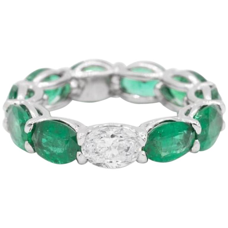 7.58ct Oval Shaped Emerald and Diamond Horizontally East West Eternity Band Ring