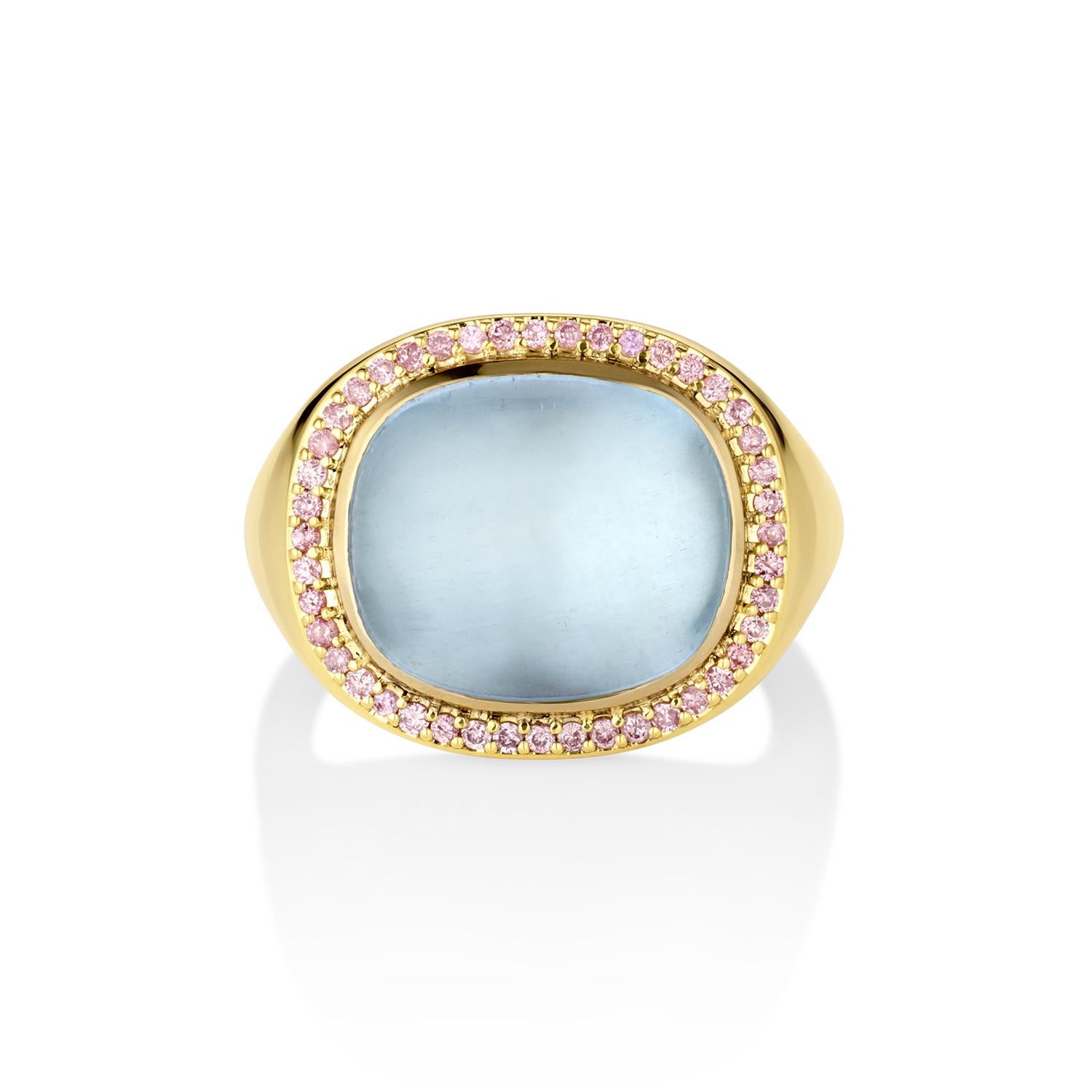 Monaco captures the elegance of Princess Grace and Monte-Carlo glamour. Her 7.59ctw aquamarine Sugarloaf cabochon shimmers like crystal waters, framed by a halo of natural blush pink diamonds (.22cttw) for a touch of modern refinement. Slip her on