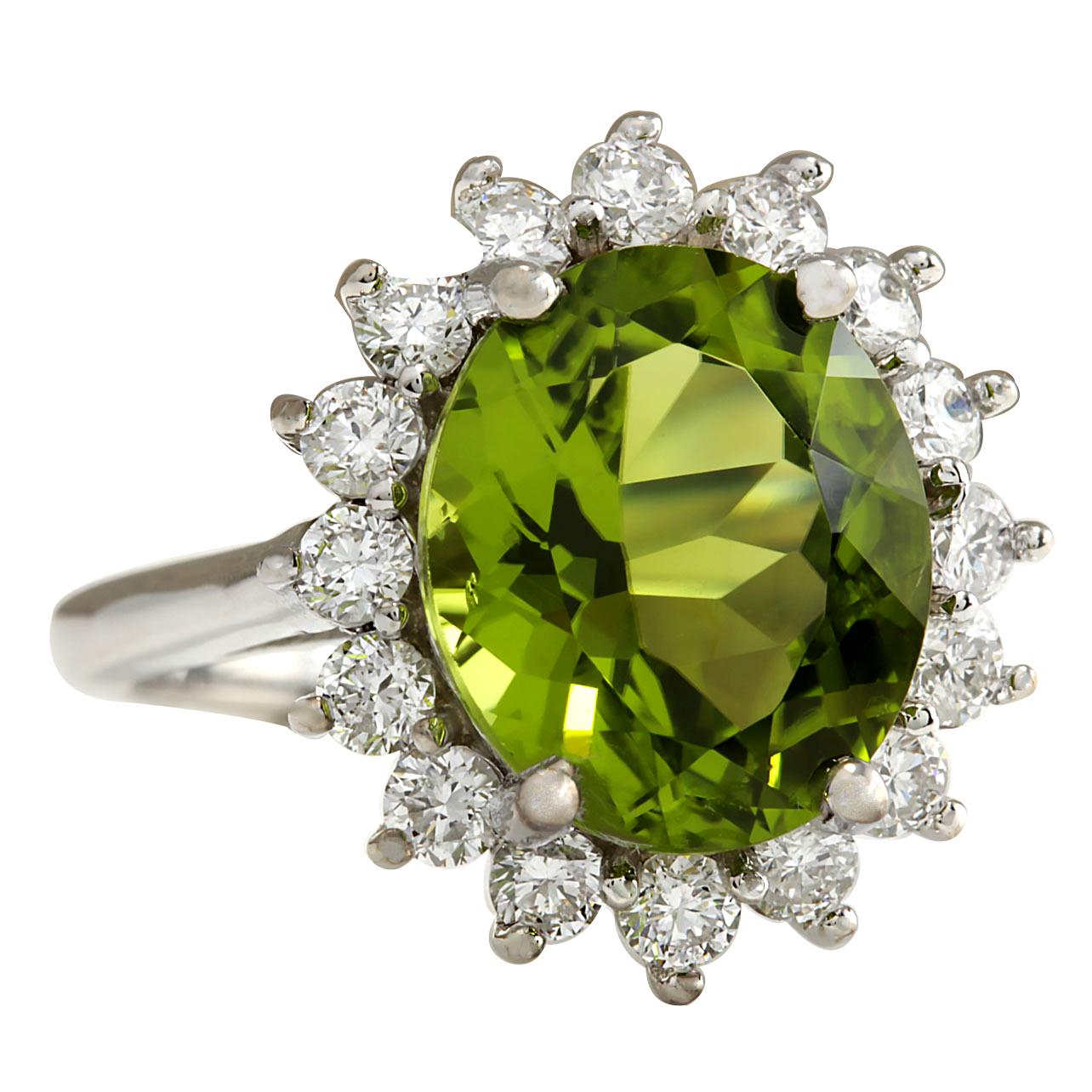 Stamped: 14K White Gold
Total Ring Weight: 6.0 Grams
Total Natural Peridot Weight is 6.51 Carat (Measures: 12.00x10.00 mm)
Color: Green
Diamond Weight: Total Natural Diamond Weight is 1.08 Carat
Color: F-G, Clarity: VS2-SI1
Face Measures: