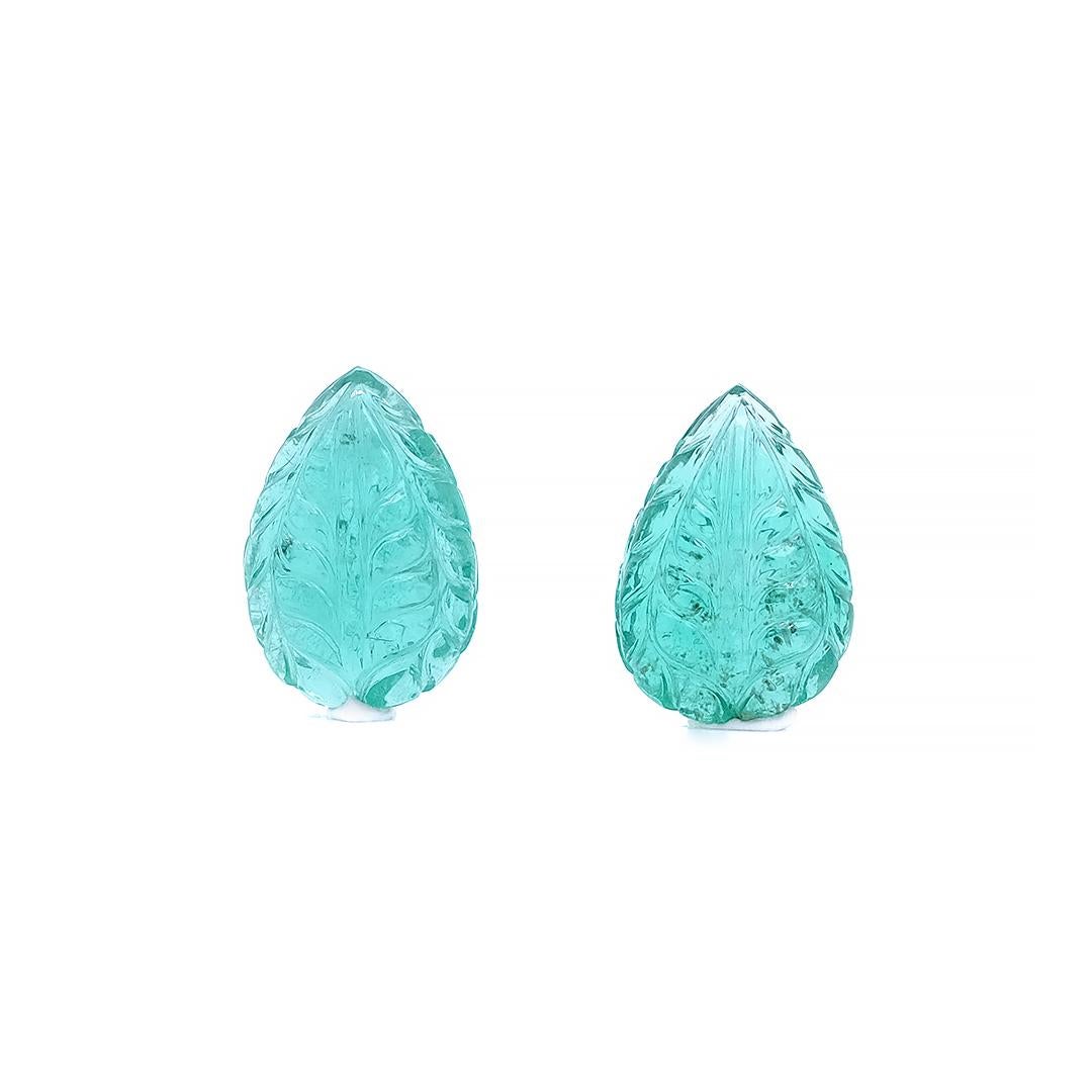 7.59 Carat Pear Shaped Carved Colombian Emerald Cabochon, Pair:

A very beautiful and elegant pair, it features two natural carved pear-shaped emerald cabochons weighing a total of 7.59 carat. The emeralds have excellent cutting proportions, and