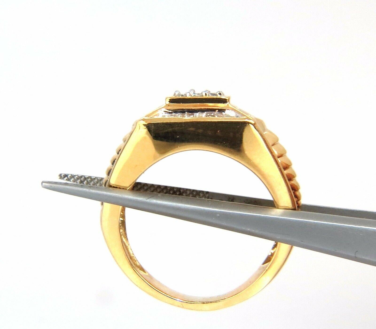 Masculine Posh.

.75ct Natural baguettes & round diamonds Mens Ring.

 Si-1 clarity / I color.

14kt. yellow gold.

9.6 grams

Deck of ring: 12.3 x 14mm

Depth: 7mm

Durable and sturdy for everyday wear, nice for pinky finger.

Current size: 8.5

&