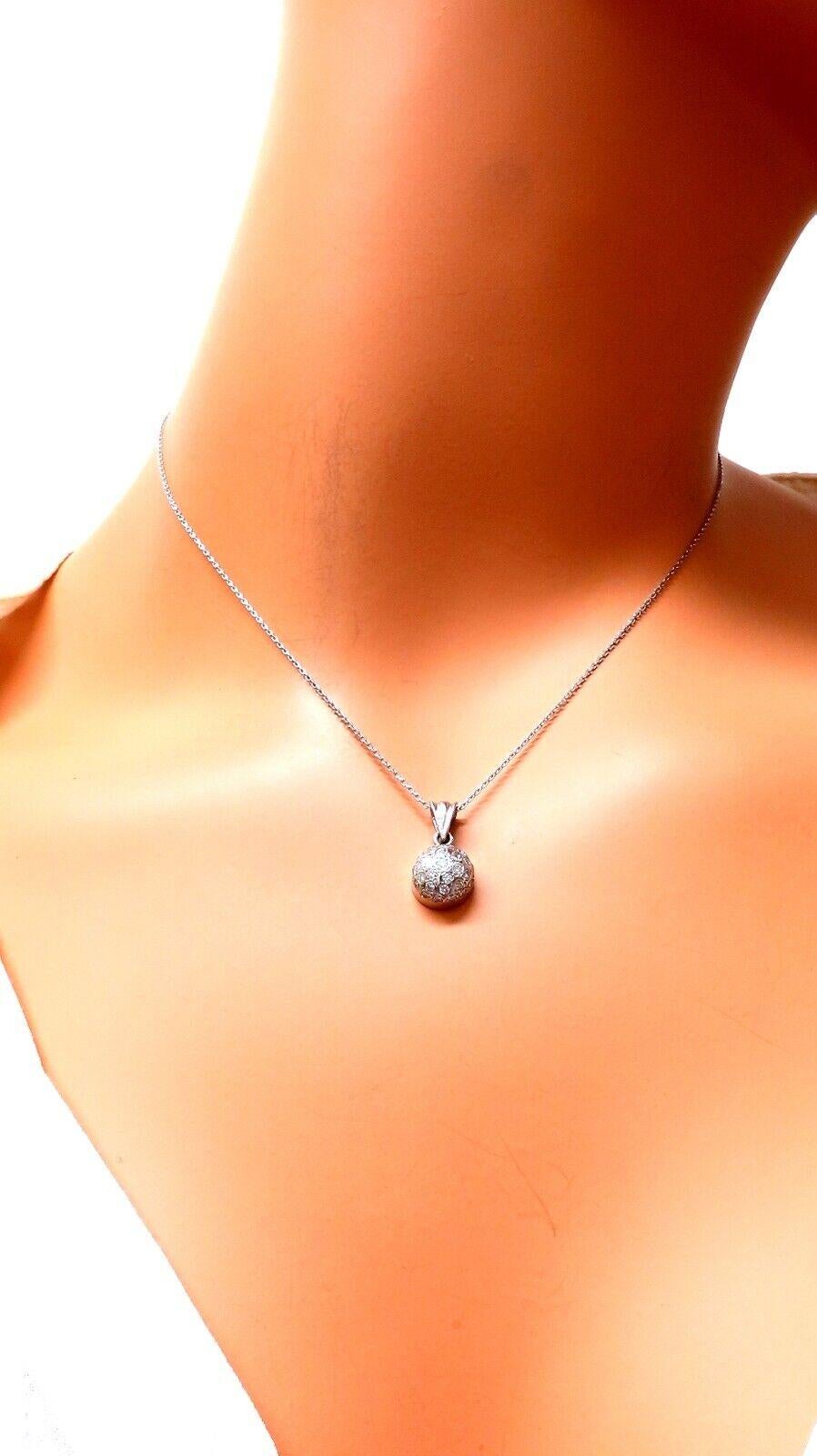 Circle Necklace 

Natural Diamonds: .75ct. Vs-2 clarity, G-color

14kt. White gold & Necklace of 16 inches

9mm ball 

3.5 grams.

The 14kt. necklace is included