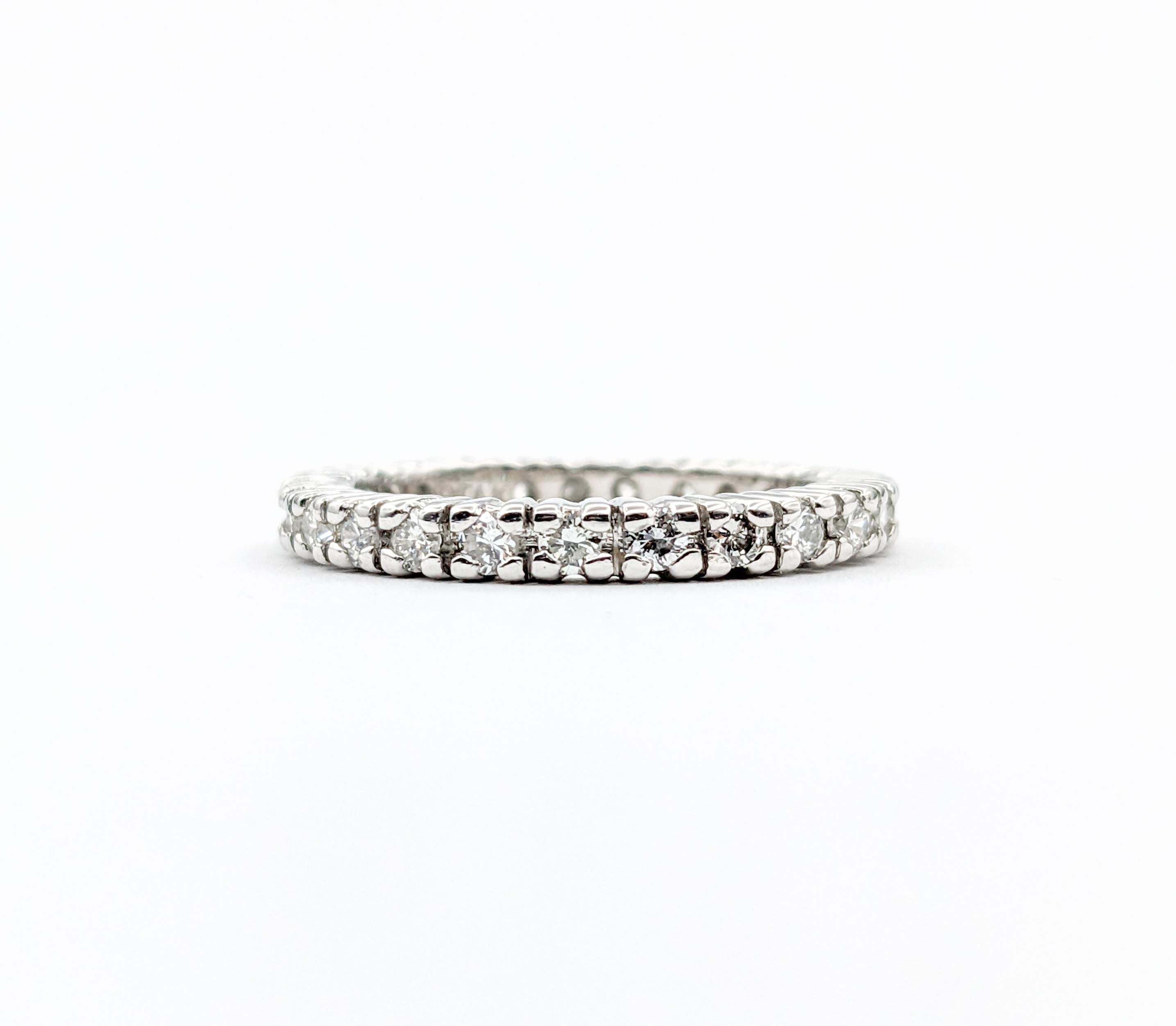 .75ctw Eternity Diamond Ring In Platinum

Presenting a truly stunning Ring, exquisitely fashioned from the finest Platinum. This elegant piece is adorned with .75 carats of round diamonds, each selected for their SI clarity and near colorless white