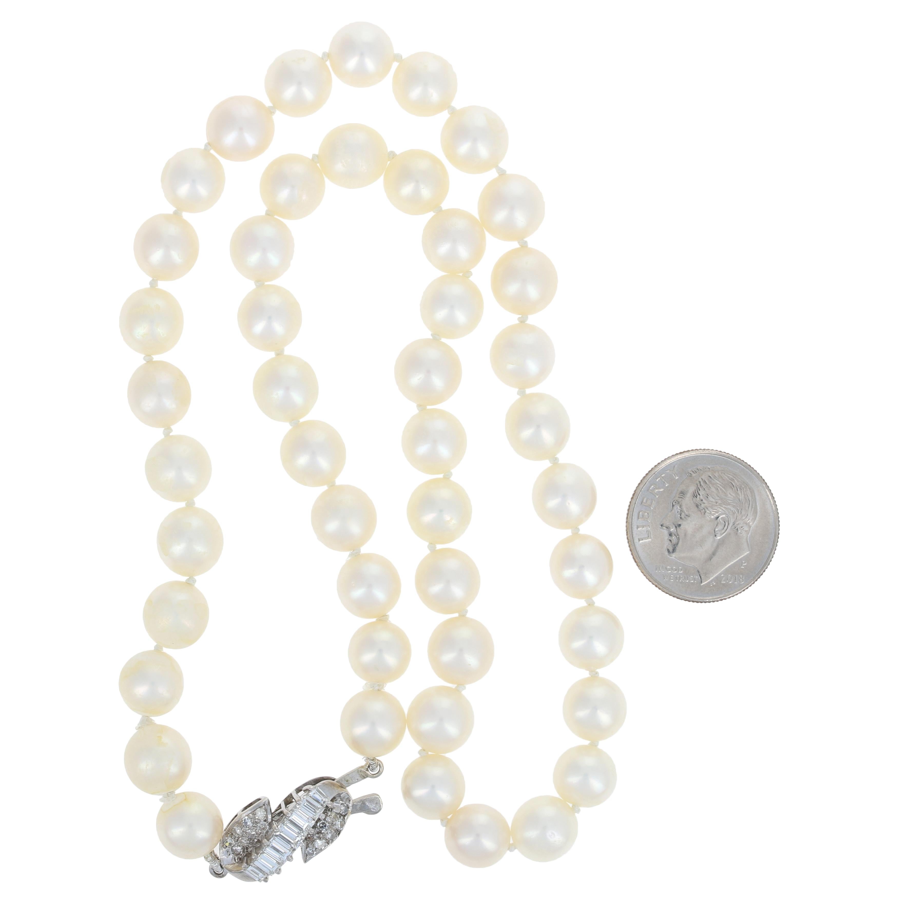 Women's Pearl Necklace, 14 Karat Gold Knotted Strand with Diamond Clasp .75 Carat For Sale