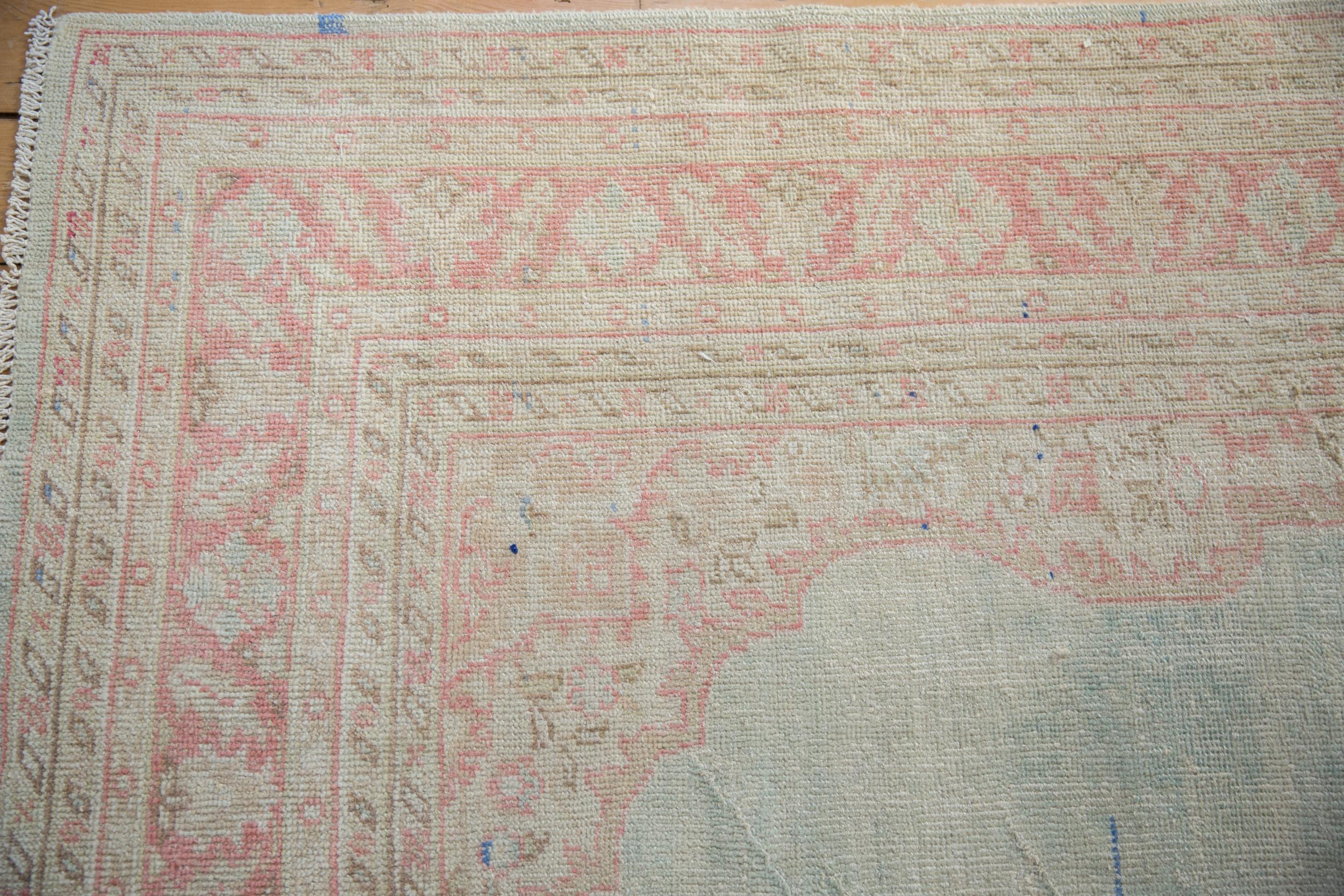 Turkish Vintage Distressed Oushak Carpet For Sale