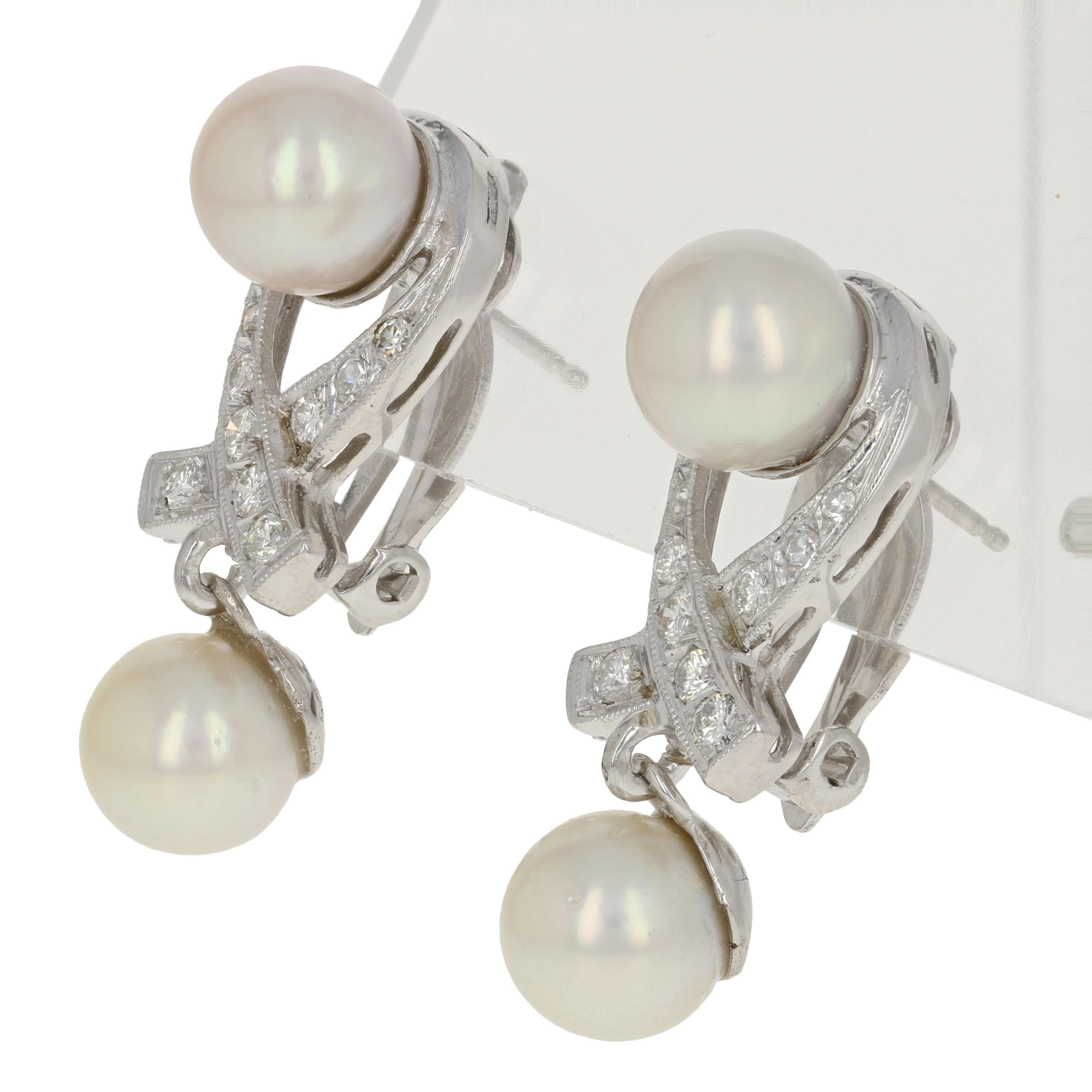 Worthy of the red carpet, these elegant earrings are ready to make you shine! This 14k white gold pair of dangles feature a gorgeous ribbon design adorned with Akoya pearls, sparkling diamonds, and sweet milgrain accents.  

Metal Content: