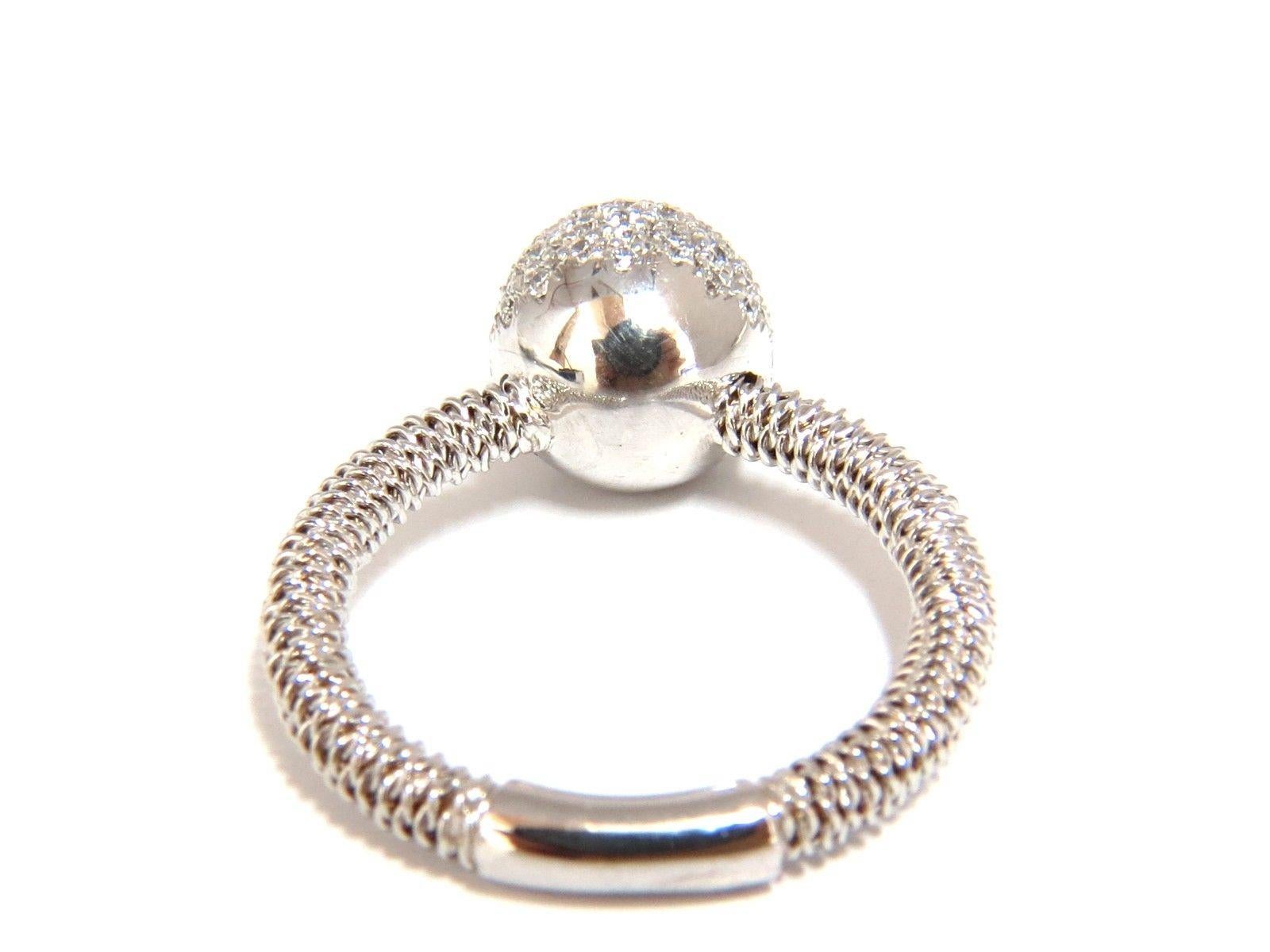 .76ct. Rounds diamond ring / encrusted ball.

ring goes through the ball.

nicely made.

Diamonds:

G-color, Vs-2  clarity

18kt. white gold

5.8 grams.

current ring size: 

6.75

Ball is 9.3mm wide.

Gorgeous coil wrap patina on shank of