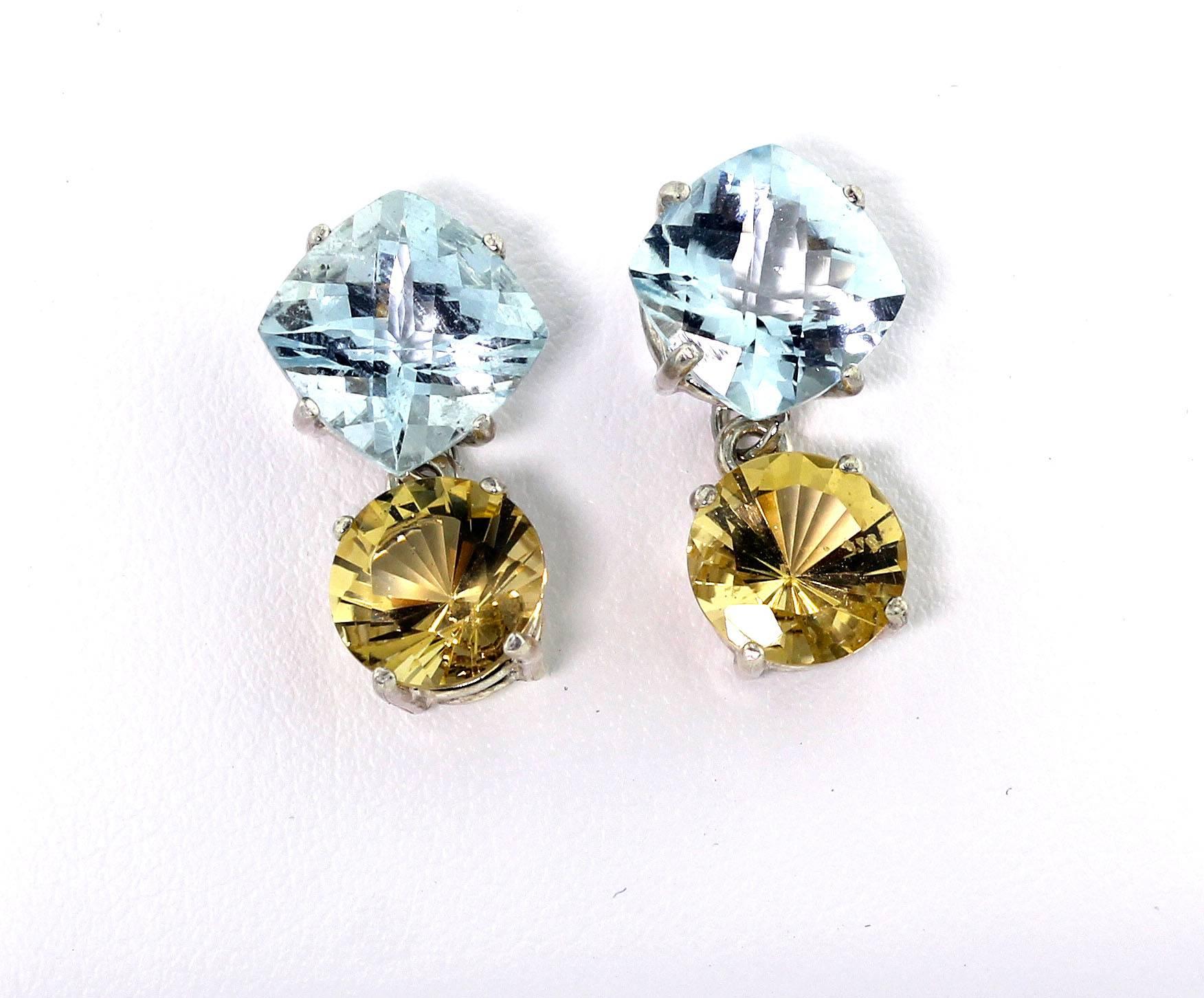 Glittering checkerboard gem cut blue Aquamarines (10 mm x 10 mm) top these swinging brilliant round gem cut yellow Beryls (9 mm) in sterling silver stud earrings.  They hang approximately 7/8 inches long.