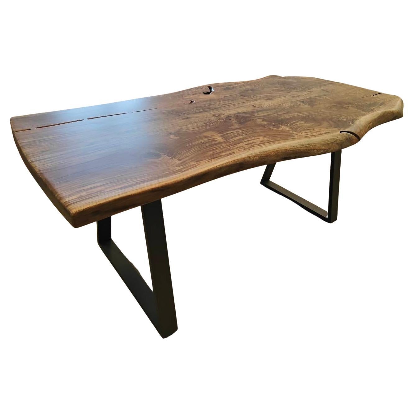 Book Matched Solid Teak Dining Table with Flaired Metal Legs For Sale