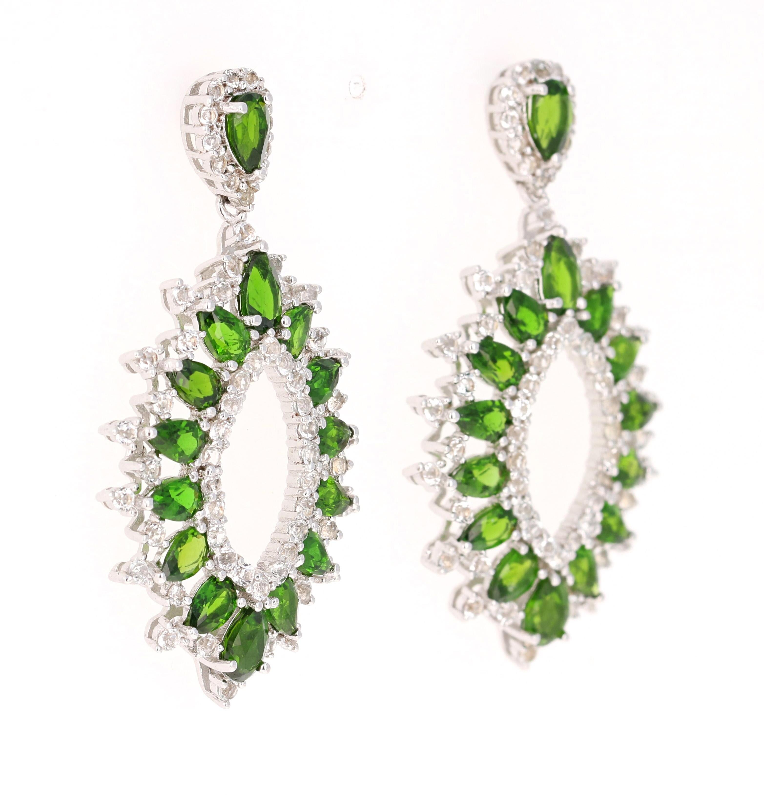 Stunning Chandelier Dangle Earrings 

These earrings have 7.60 Carats of Chrome Diopside and White Topaz

They are beautifully curated in 925 Silver weighing approximately 10.0 grams 

They are 1.75 inches long. 

