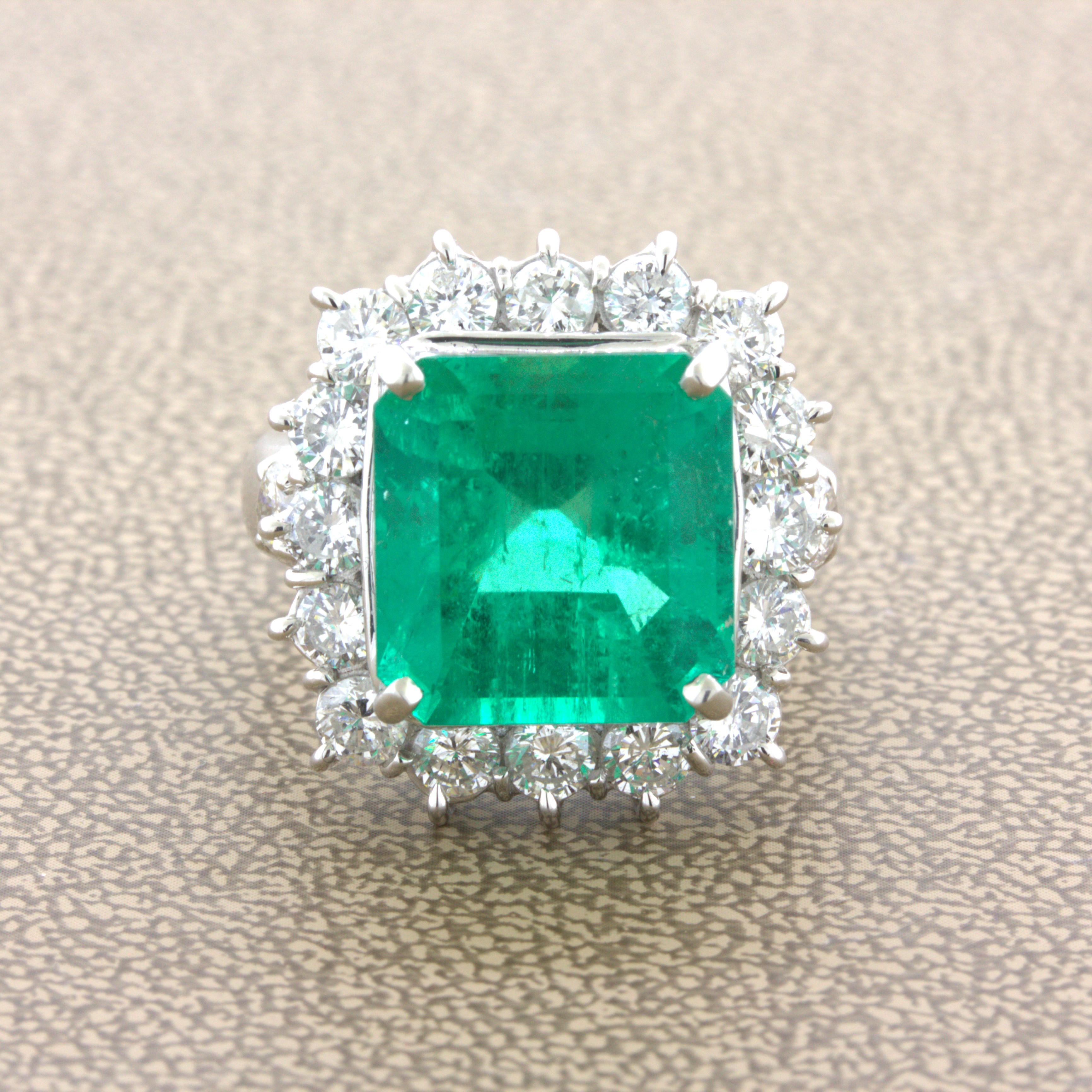 A very fine gem-quality GRS certified Colombian emerald takes center stage. It weighs an impressive 7.60 carats and has the ideal intense glass green color with excellent brightness allowing the stone to glow in the light. It is complemented by a