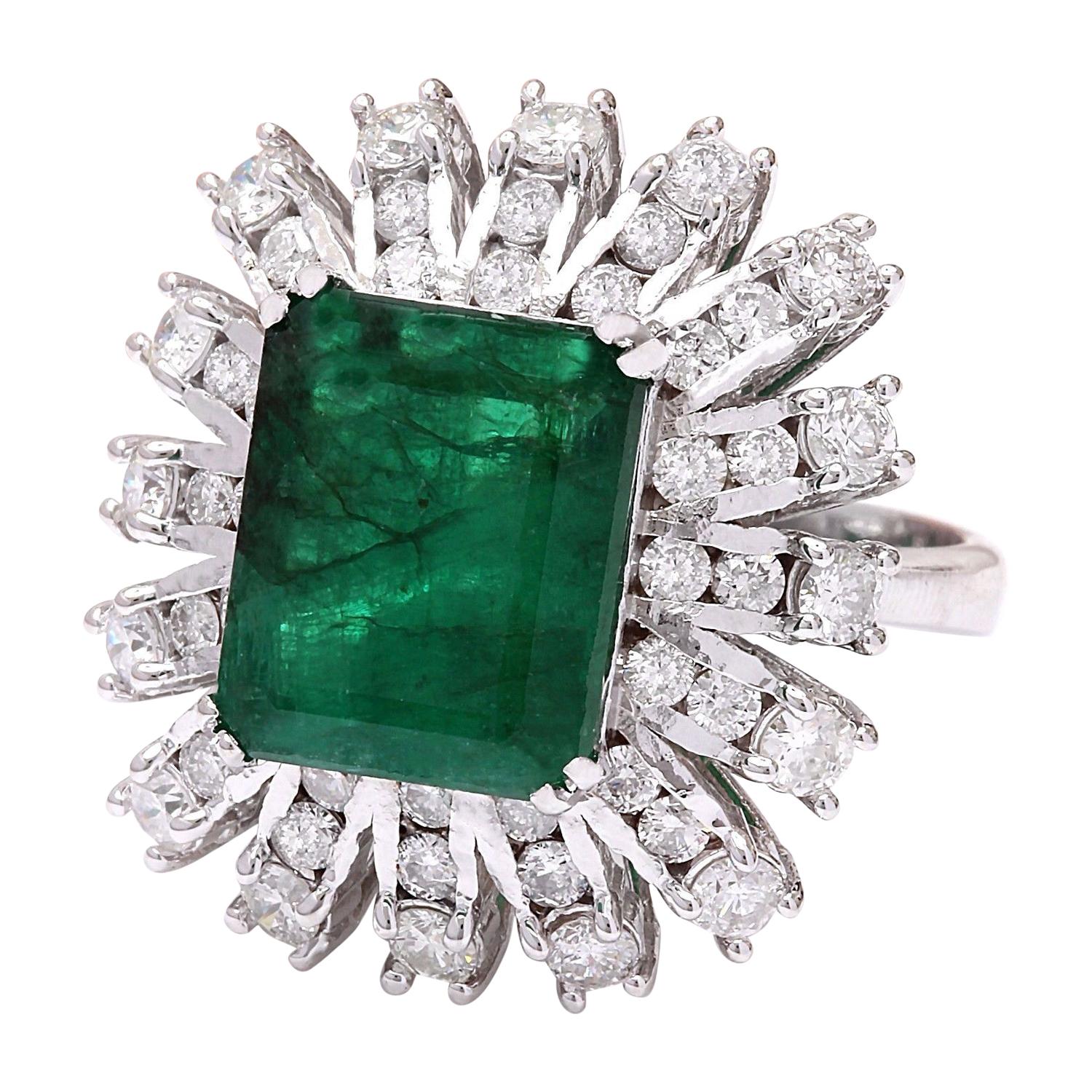 Introducing our stunning 14K Solid White Gold Diamond Ring, adorned with a captivating 7.60 Carat Emerald as its centerpiece. Meticulously crafted from luxurious 14K white gold, this ring boasts a total metal weight of 7 grams, ensuring both