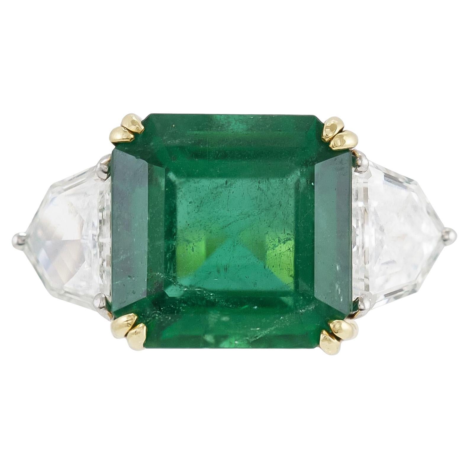 7.60 Carat Emerald and 1.30 Carat Shield cut Diamonds Ring