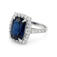7.60 Carat Oval Sapphire GIA and Diamond Platinum Statement Vintage Halo Ring