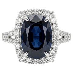 7.60 Carat Oval Sapphire GIA and Diamond Platinum Statement Vintage Halo Ring