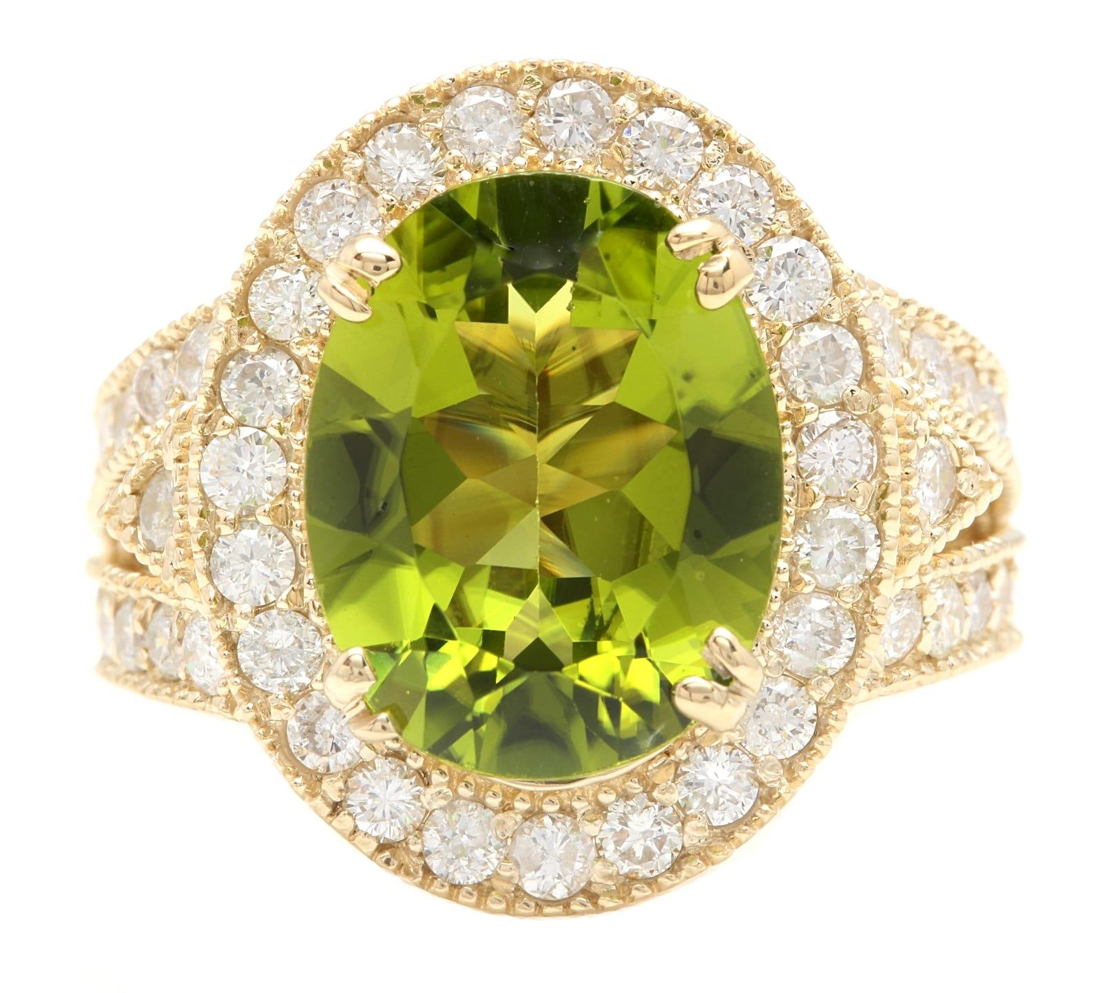 7.60 Carats Impressive Natural Peridot and Diamond 14K Yellow Gold Ring

Suggested Replacement Value: Approx. $7,500.00

Total Natural Peridot Weight is: Approx. 6.00 Carats

Peridot Measures: Approx. 14.00 x 10.00mm

Natural Round Diamonds Weight: