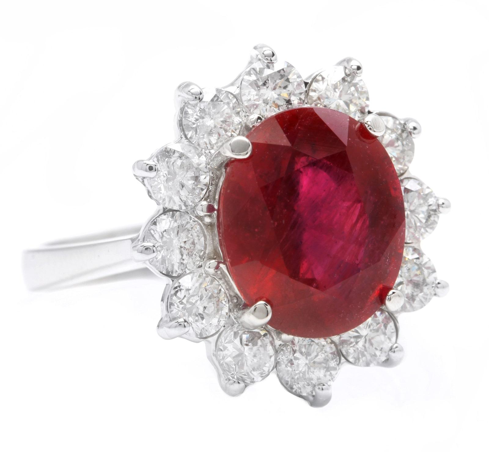7.60 Carats Impressive Red Ruby and Diamond 14K Solid White Gold Ring

Suggested Replacement Value $6,000.00

Total Red Ruby Weight is: Approx. 6.00 Carats 

Ruby Measures: 11x 9mm (Lead Glass Filled)

Natural Untreated Round Diamonds Weight: 1.60