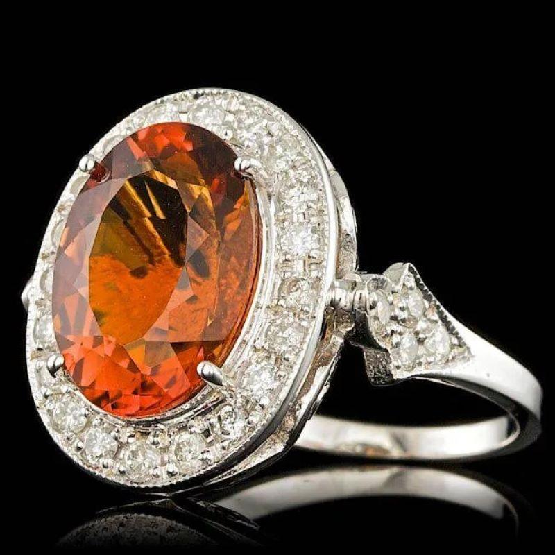 Anillo de oro blanco macizo de 14 quilates con citrino natural y diamante de 7,60 quilates

El Peso Total del Citrino Oval Natural es Aprox. 6.00 Quilates 

Medidas del Citrino: Aprox. 14.00 x 10.00mm
 
Diamantes Redondos Naturales Peso: Aprox. 1,60