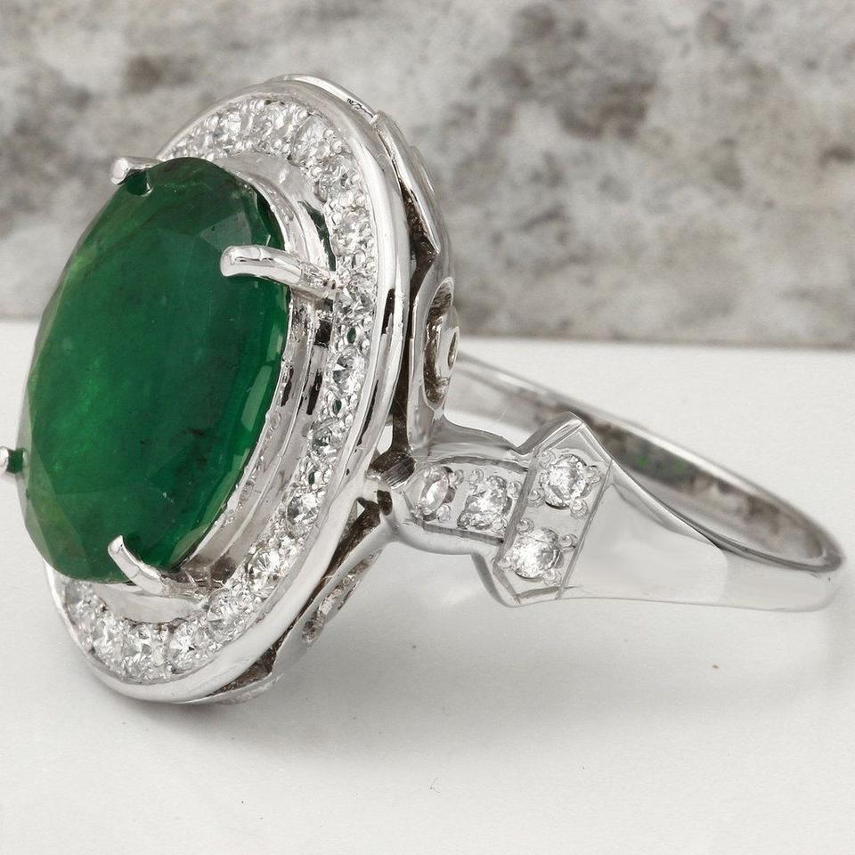 7.60 Carats Natural Emerald and Diamond 14K Solid White Gold Ring

Total Natural Green Emerald Weight is: 6.50 Carats

Emerald Measures: 13.00 x 10.00mm

Natural Round Diamonds Weight: Approx. 1.10 Carats (color G-H / Clarity SI1-SI2)

Ring size: 7