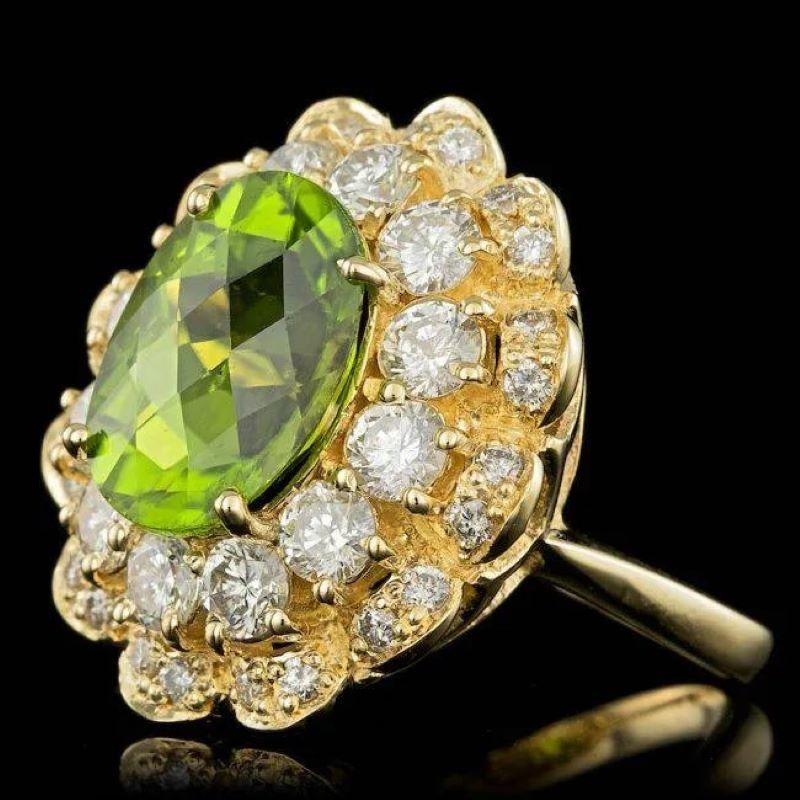 7.60 Carats Natural Peridot and Diamond 14K Solid Yellow Gold Ring

Total Natural Oval Peridot Weight is: Approx. 5.40 Carats 

Peridot Measures: Approx. 13.00 x 10.00mm
 
Natural Round Diamonds Weight: Approx. 2.20 Carats (color G-H / Clarity