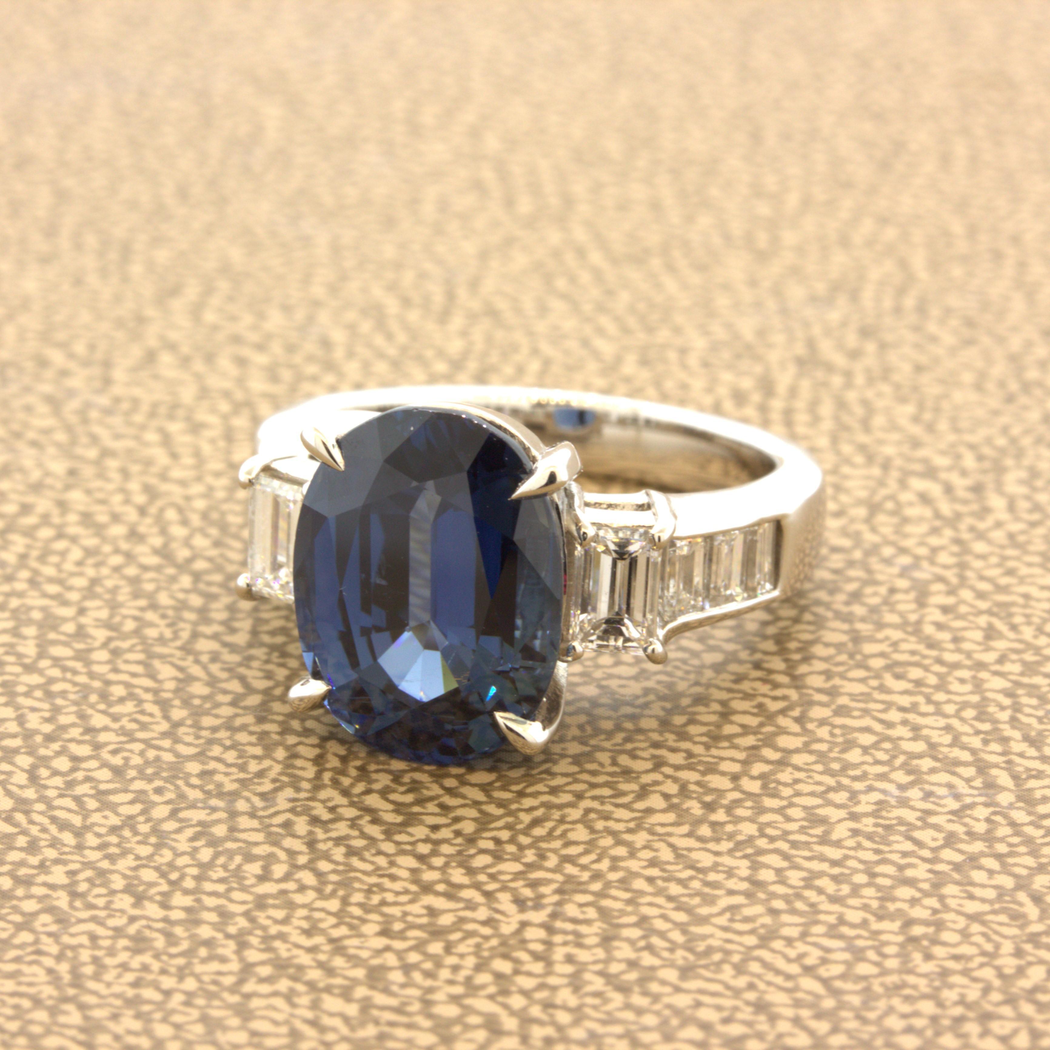 A large and impressive sapphire weighing 7.61 carats. The sapphire is certified by the GIA as natural with no treatment of any kind. It has a bright open blue color and is very clean with no visible inclusions. IT is complemented by 1.03 carats of