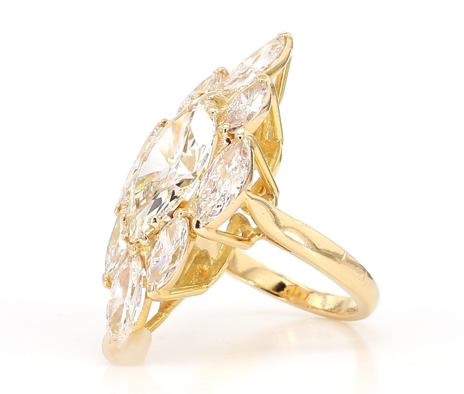 Elevate your style with our sophisticated Pear-Cut Diamond Shuttle Ring, expertly crafted in 18K gold. This exquisite ring features two dazzling pear-shaped diamonds with a combined weight of 7.62 carats, offering a harmonious balance of elegance
