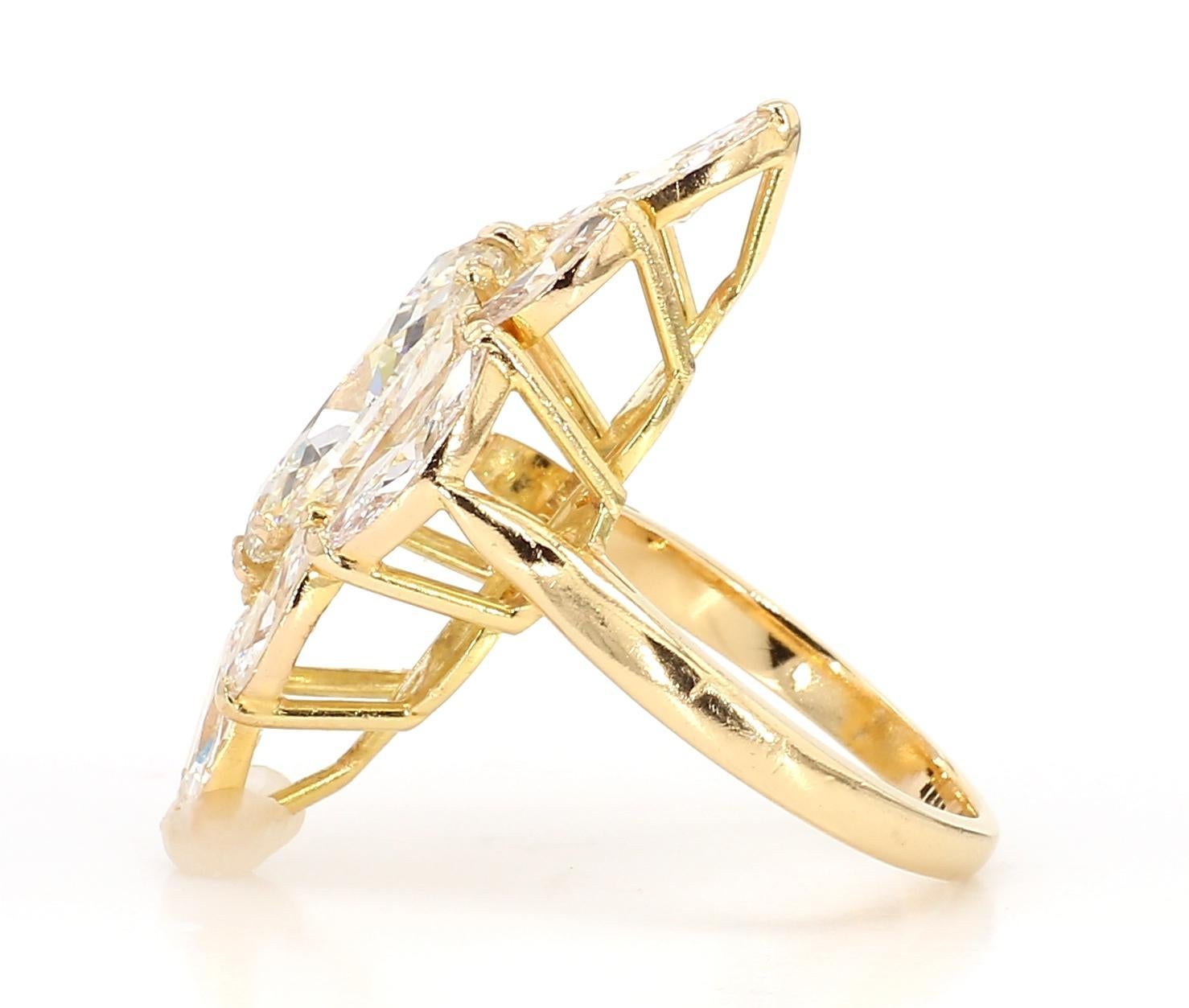 Modern 7.62 Carat Pear-Cut Diamond Shuttle Ring in 18K Gold For Sale