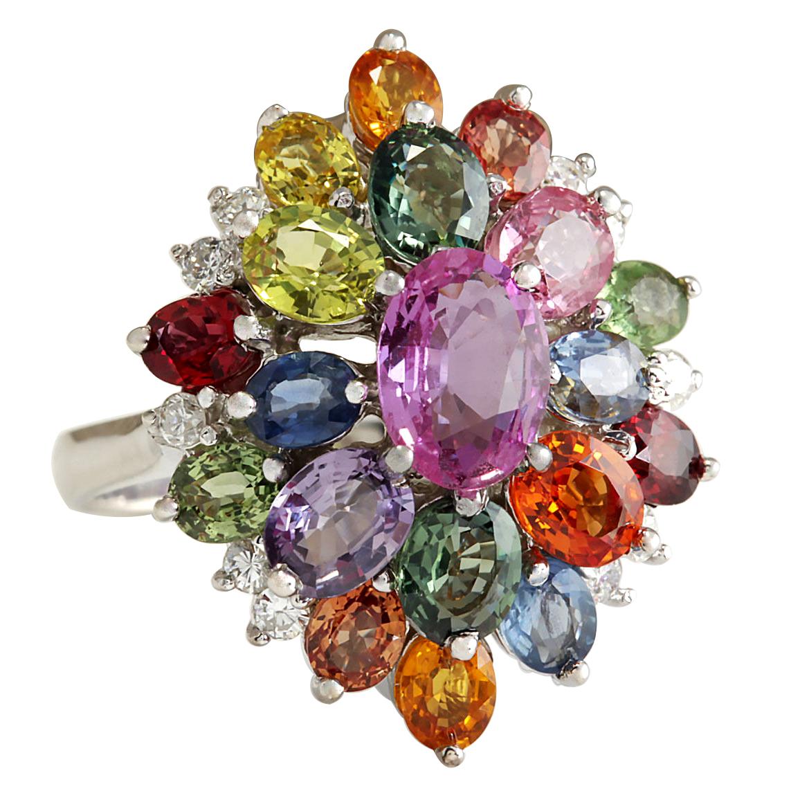 Stamped: 14K White Gold
Total Ring Weight: 6.5 Grams
Total Natural Center Ceylon Sapphire Weight is 1.30 Carat (Measures: 8.00x6.00 mm)
Color: Pink
Total Natural Side Ceylon Sapphire Weight is 6.03 Carat
Color: Multicolor
Diamond Weight: Total