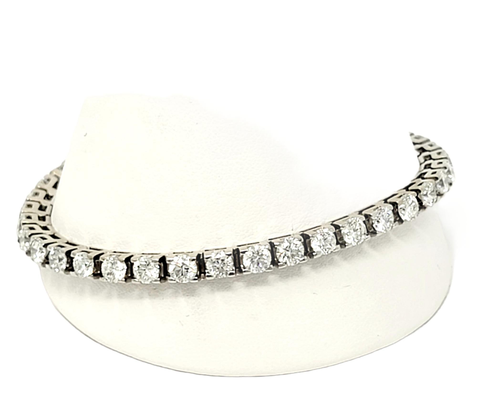 Absolutely stunning diamond tennis bracelet that will stand the test of time. The elegant white gold setting paired with the timeless round diamonds makes this piece a true classic that will never go out of style.   
This gorgeous bracelet features