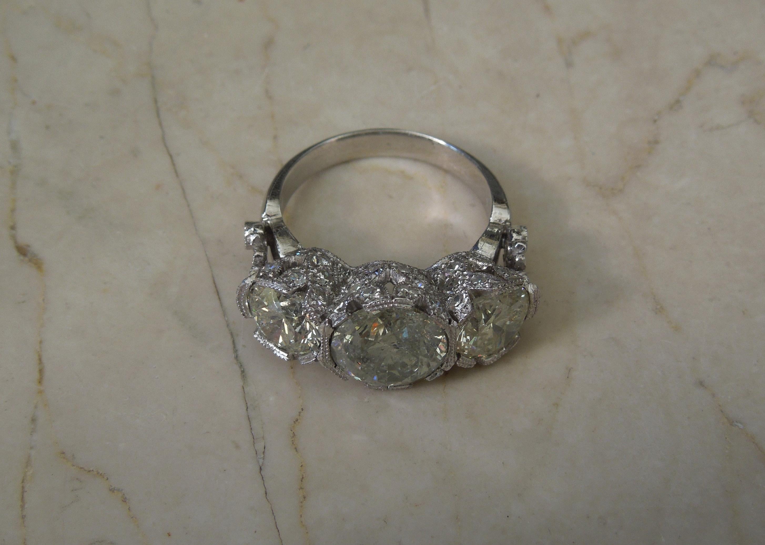 Brilliant Cut 7.64 Carat Three Diamond Platinum Tulip Ring For Sale