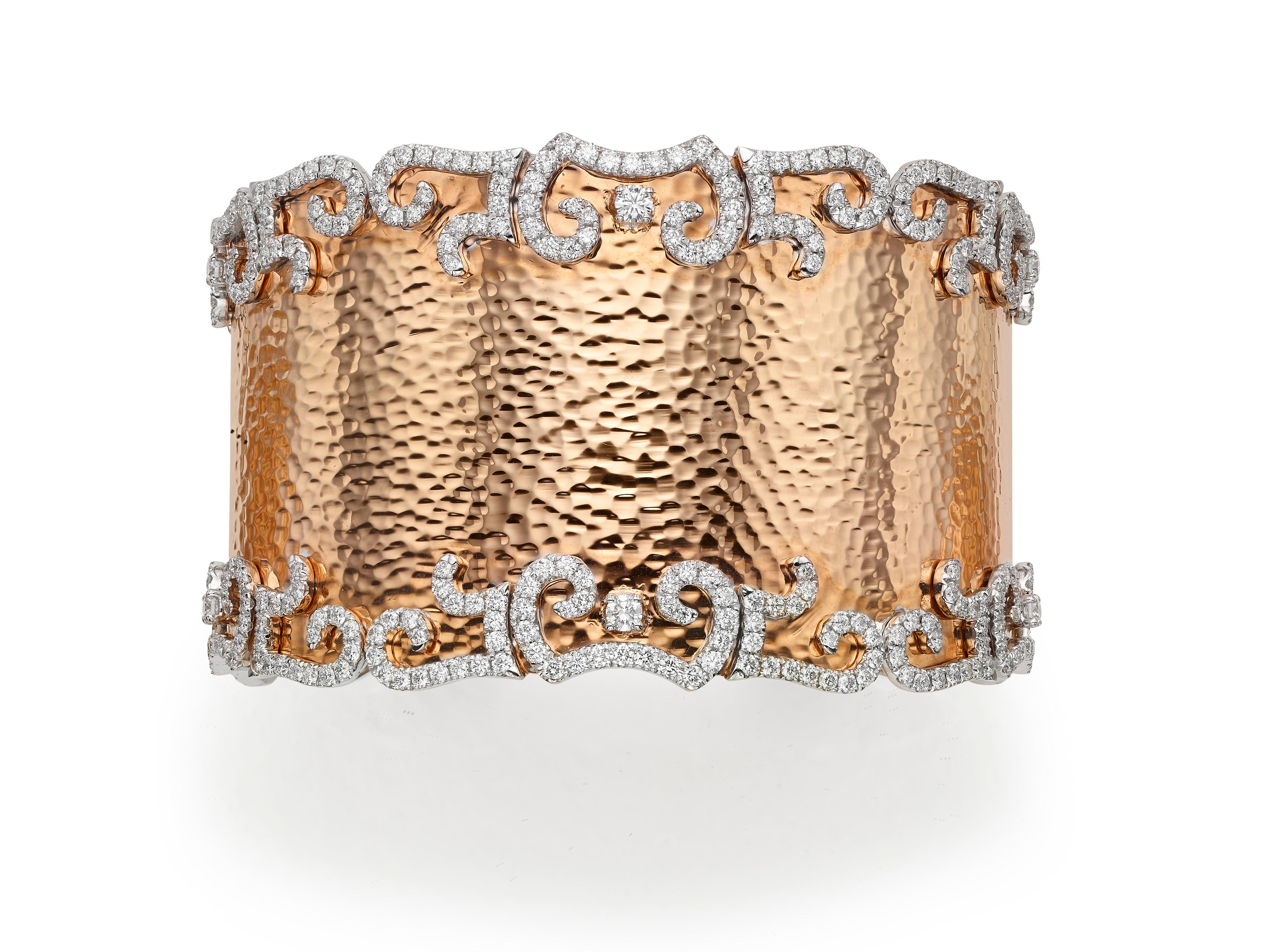 Butani’s rose gold and diamond cuff bangle is the perfect gift to celebrate a special occasion.  Made from hammered 18K rose gold, the cuff is detailed with 7.65 carats of diamonds to resemble a magnificent floral wreath.

Composition:
18K Rose