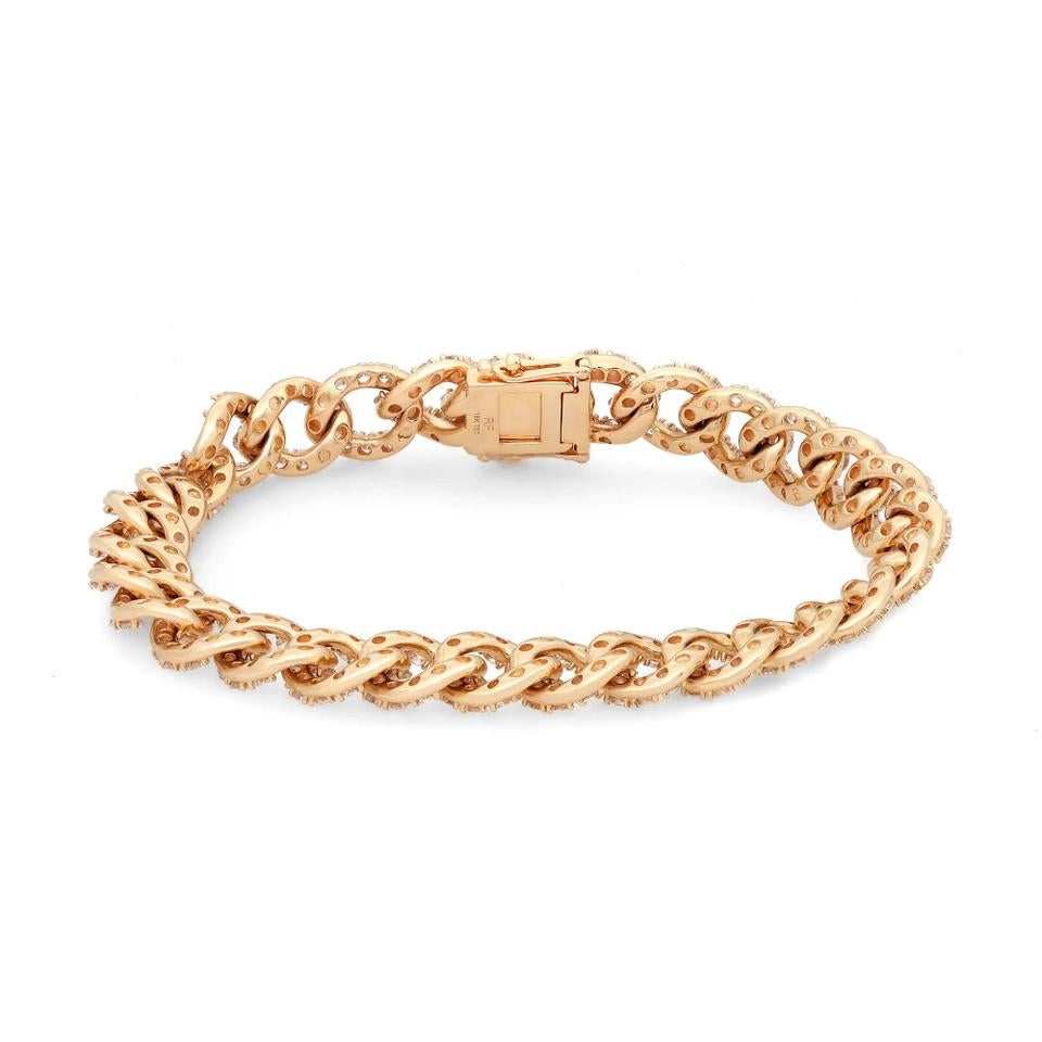 Introducing our exquisite 7.65 Carat Diamond Chain Link Bracelet in 18k Yellow Gold. This signature piece is adorned with a breathtaking pave of diamonds, covering one side of the tightly woven Cuban link bracelet. The result is a stunning display