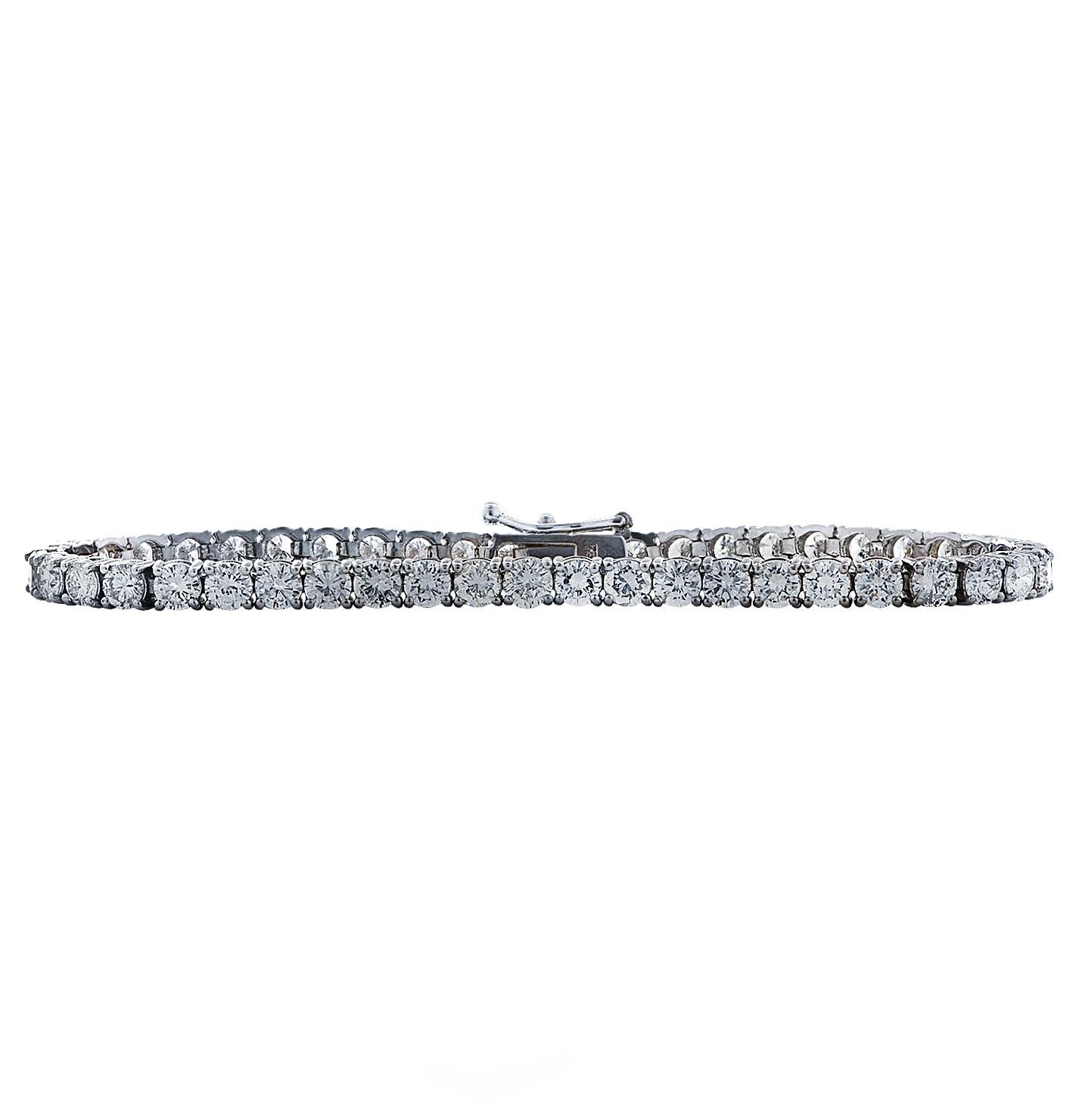 Exquisite diamond tennis bracelet crafted in 18 karat white gold, showcasing 47 round brilliant cut diamonds weighing approximately 7.65 carats total, G-H color, VS-SI clarity, set in a seamless eternity of diamonds, creating a spectacular symphony