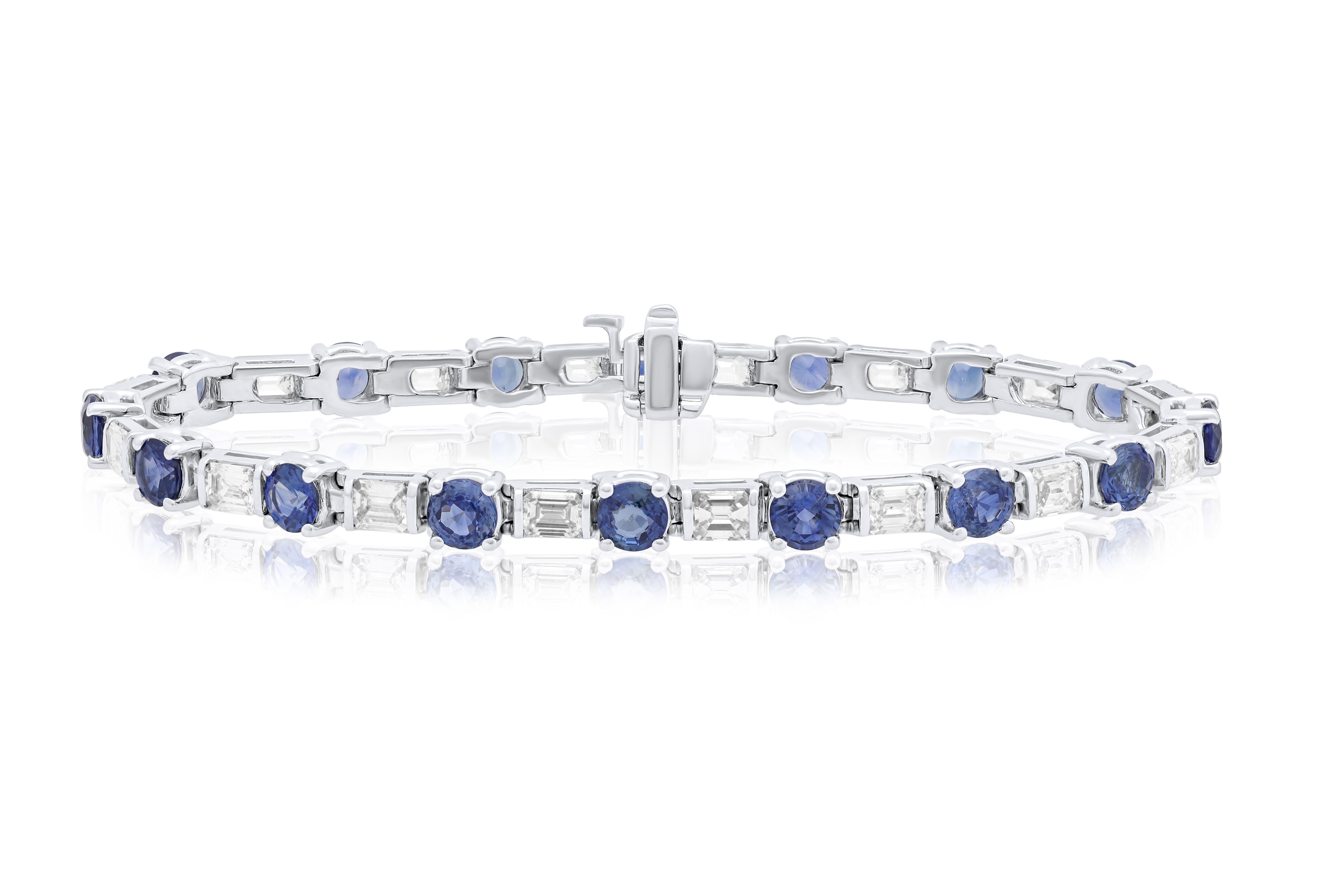 18 kt white gold sapphire and diamond eternity bracelet adorned with 7.65 cts tw of round sapphires separated by 2.05 cts tw of baguette cut diamonds