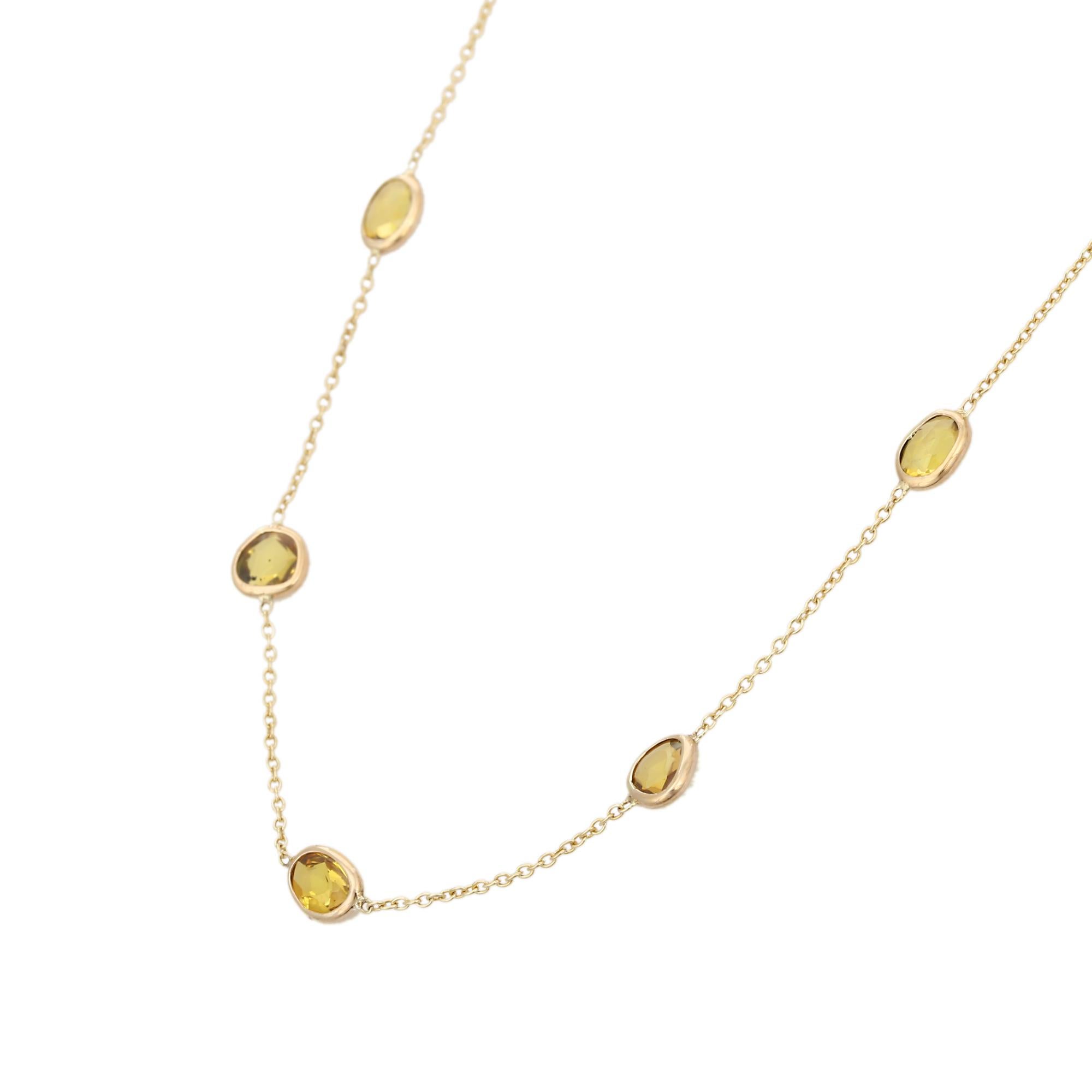 Yellow Sapphire Station Chain Necklace in 14K Gold studded with round cut yellow sapphire. This stunning piece of jewelry instantly elevates a casual look or dressy outfit. 
Sapphire stimulate concentration and reduces stress.
Designed with a yellow