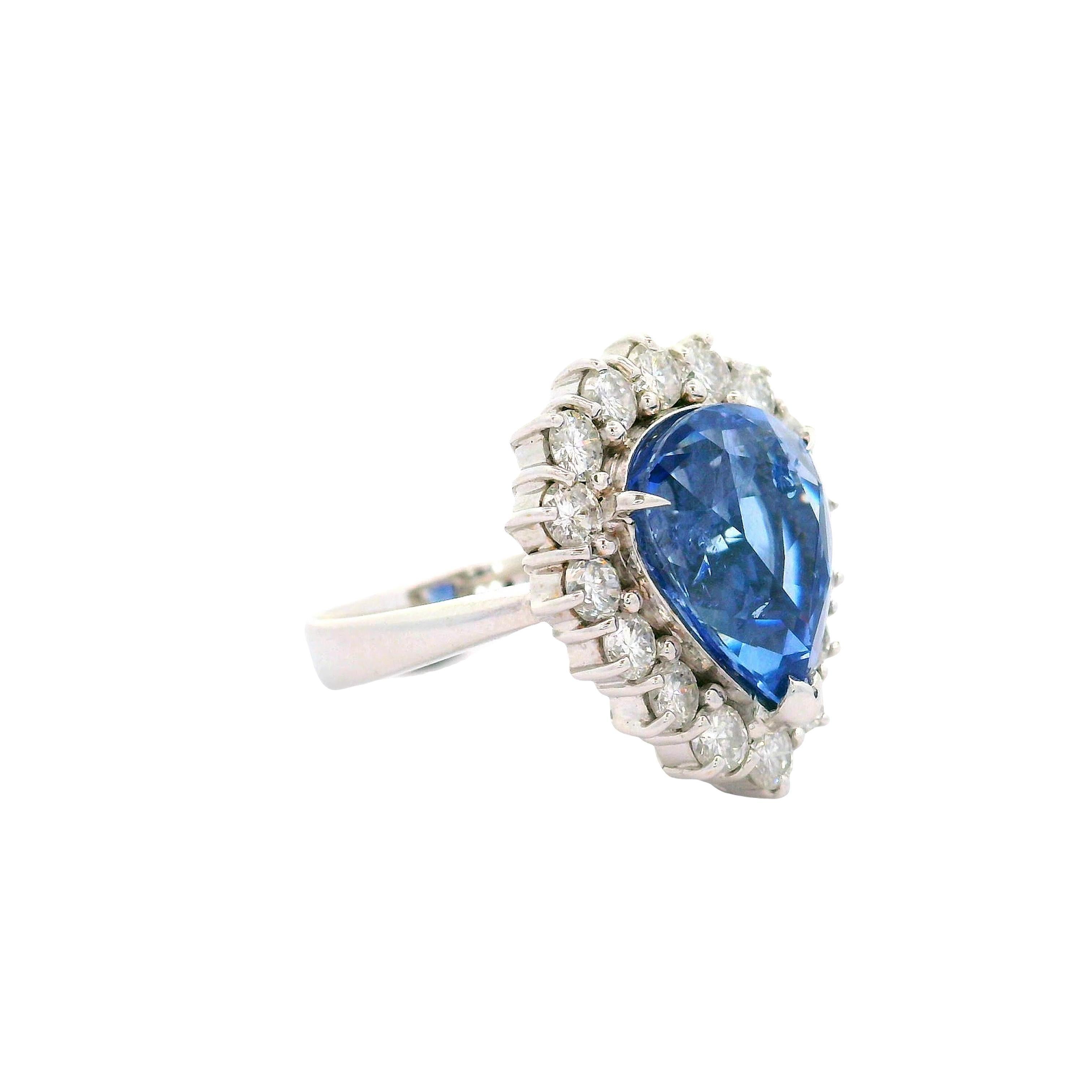 Pear Cut 7.67 Carat Blue Sapphire Diamond Halo 18K White Gold Ring For Sale