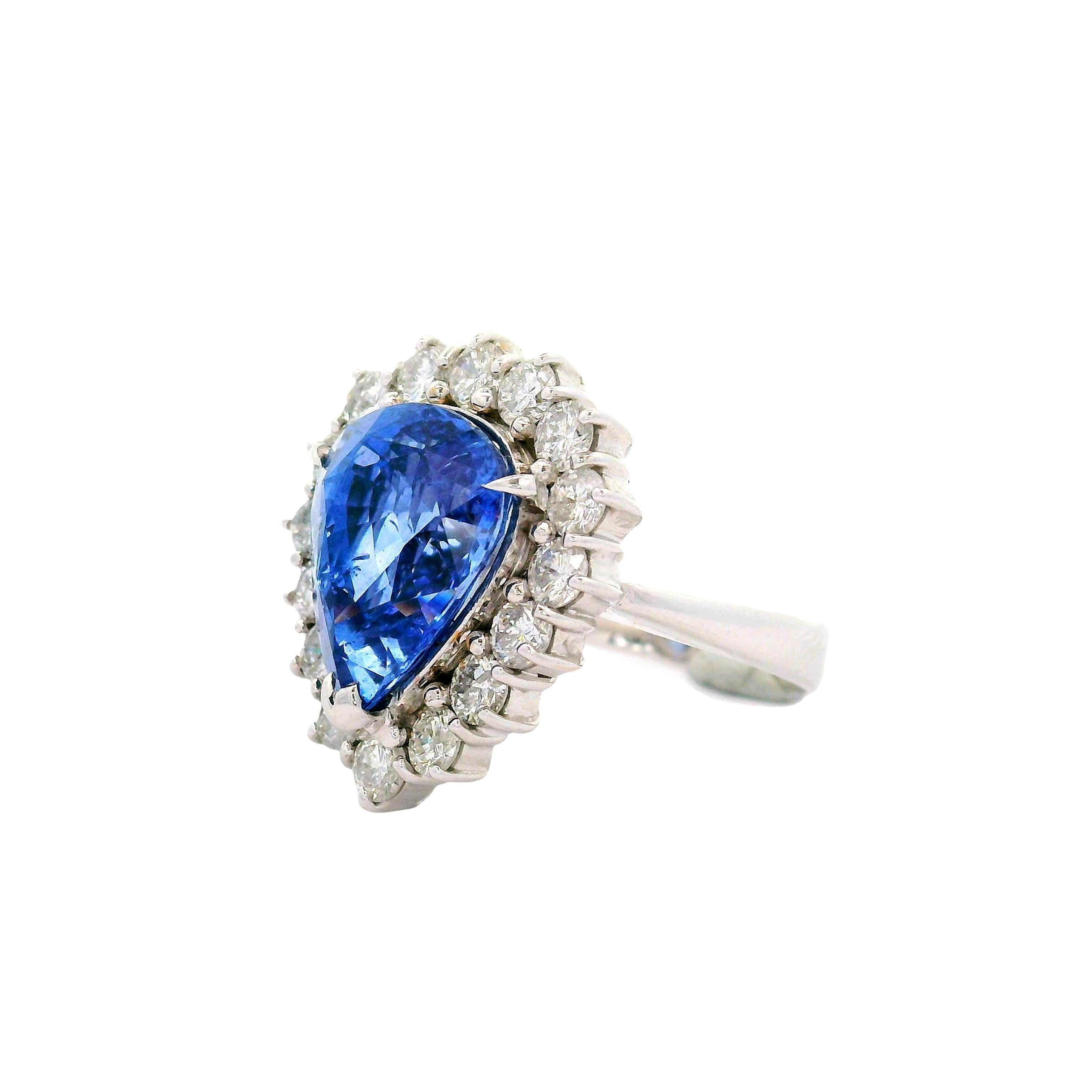 7.67 Carat Blue Sapphire Diamond Halo 18K White Gold Ring In Excellent Condition For Sale In Beverly Hills, CA