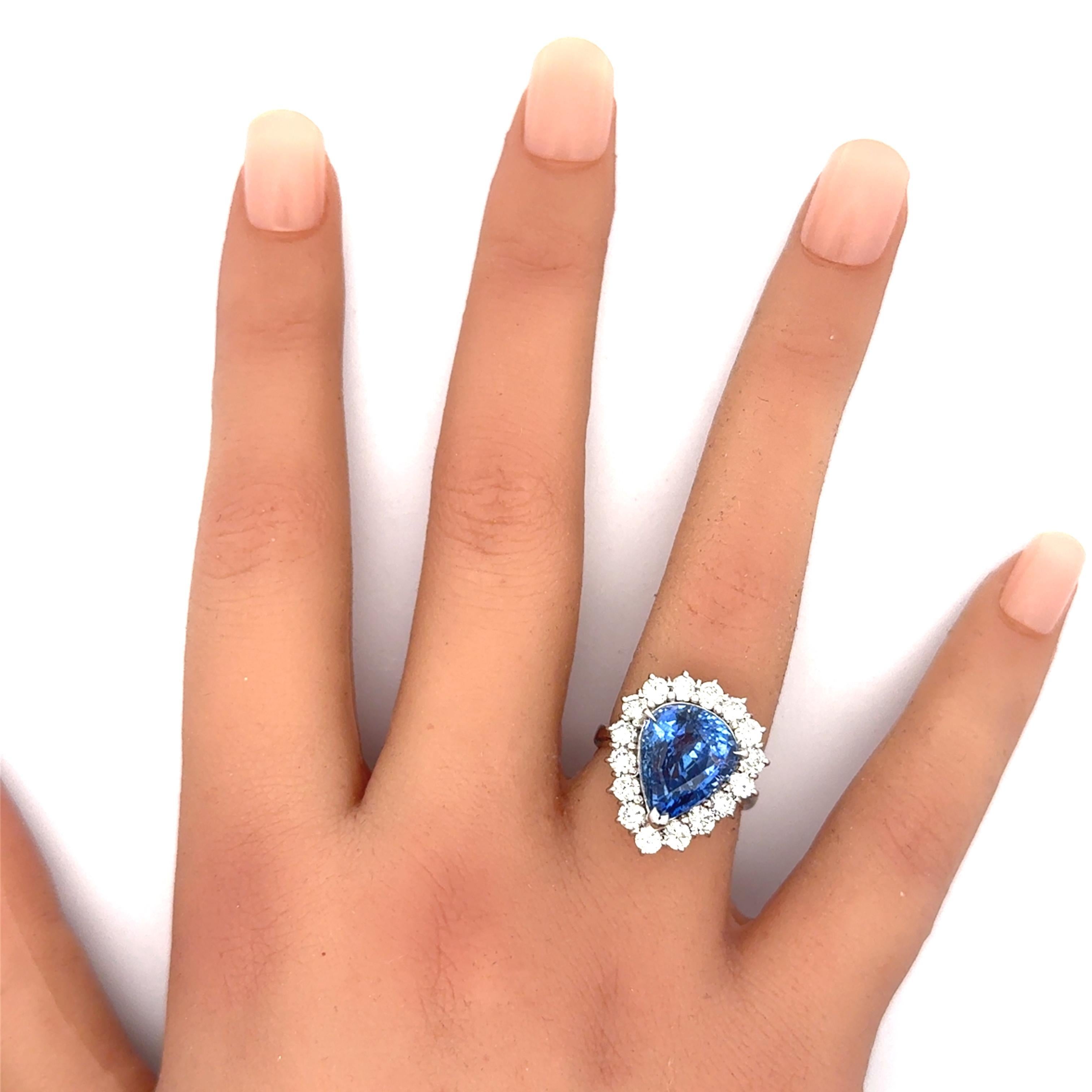 Women's 7.67 Carat Blue Sapphire Diamond Halo 18K White Gold Ring For Sale