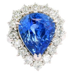 7.67 Carat Blue Sapphire Diamond Halo 18K White Gold Ring