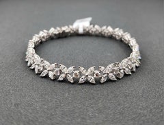 Pulsera tipo «tennis» con diamantes de corte marquesa y redondo de 7,67 ct en oro blanco de 18k