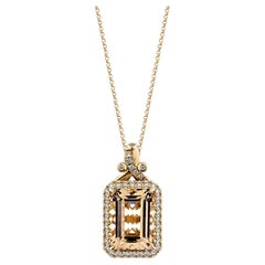 Pendentif Morganite de 7,673 carats en or rose 18 carats avec diamant blanc.