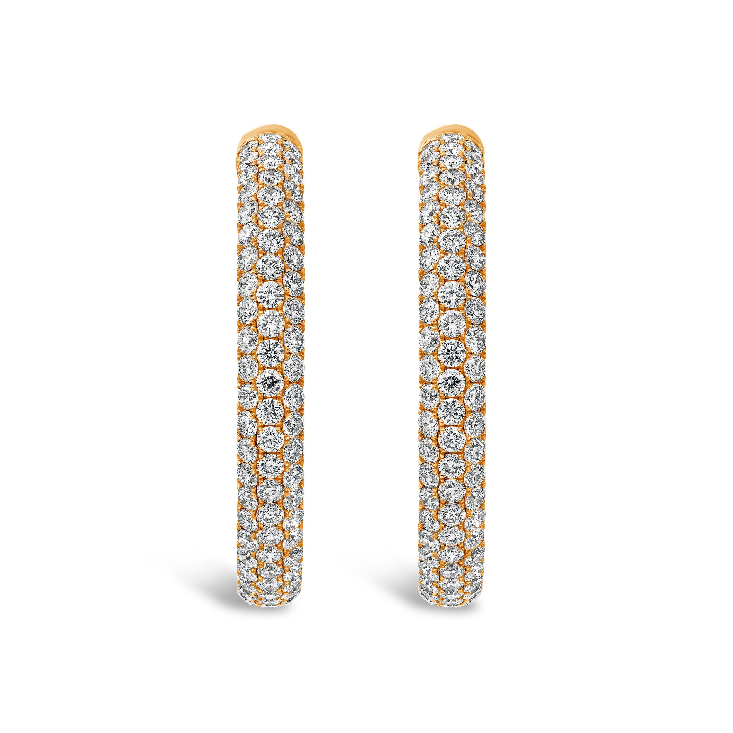 A classic pair of hoop earrings, showcasing round diamonds weighing 7.68 carats total. The diamonds are pavé-set on the front facing part of the hoops. Finely made in 18K rose gold.

Roman Malakov is a custom house, specializing in creating anything