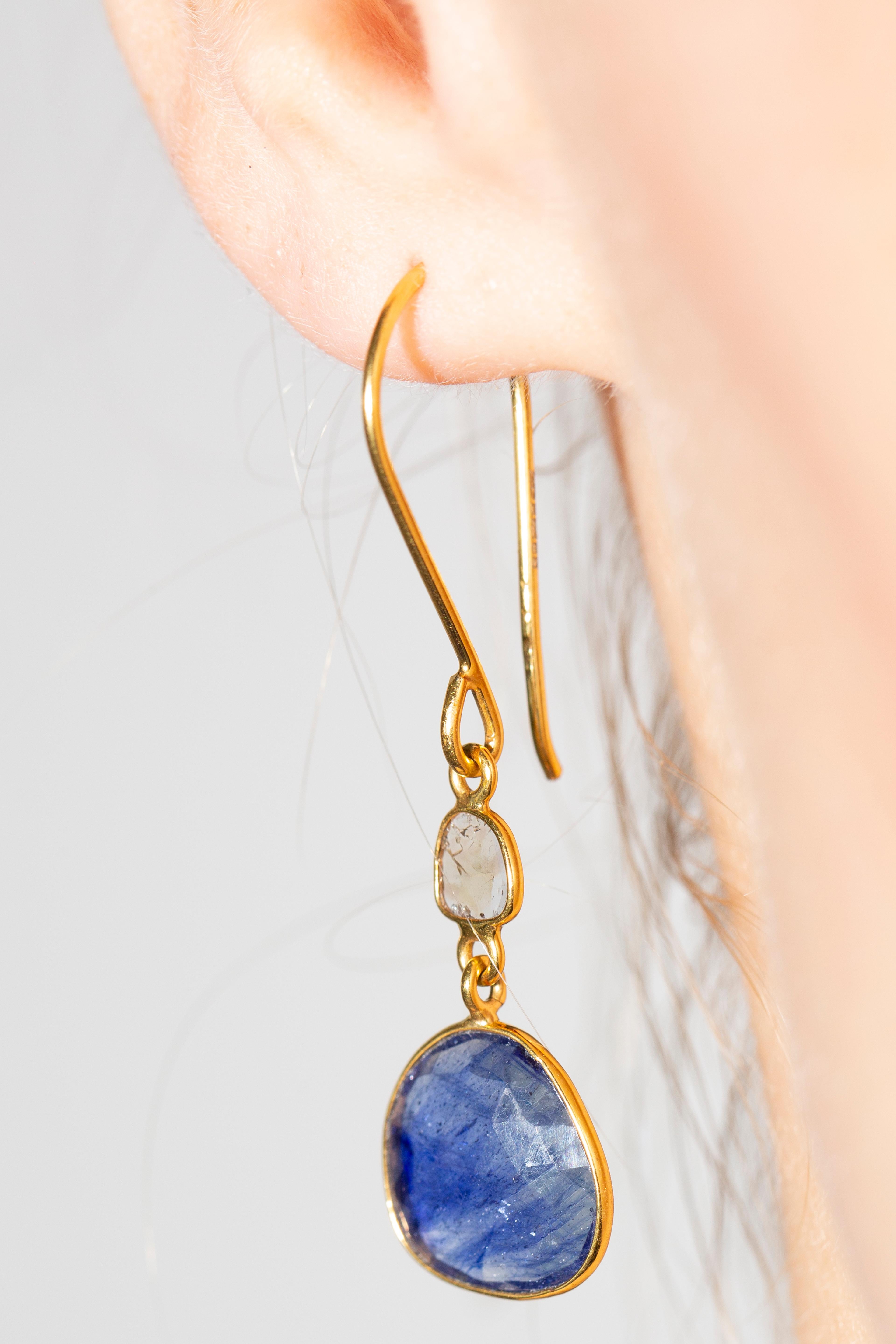 These Gorgeous 7.50 Carat Rose Cut Blue Sapphire Earrings from the Artisan Collection made by Tresor Paris featuring 0.18 Carat in two Diamond slices set in 18 Karat Yellow Gold. Each piece is hand made with a unique shaped precious stones. These