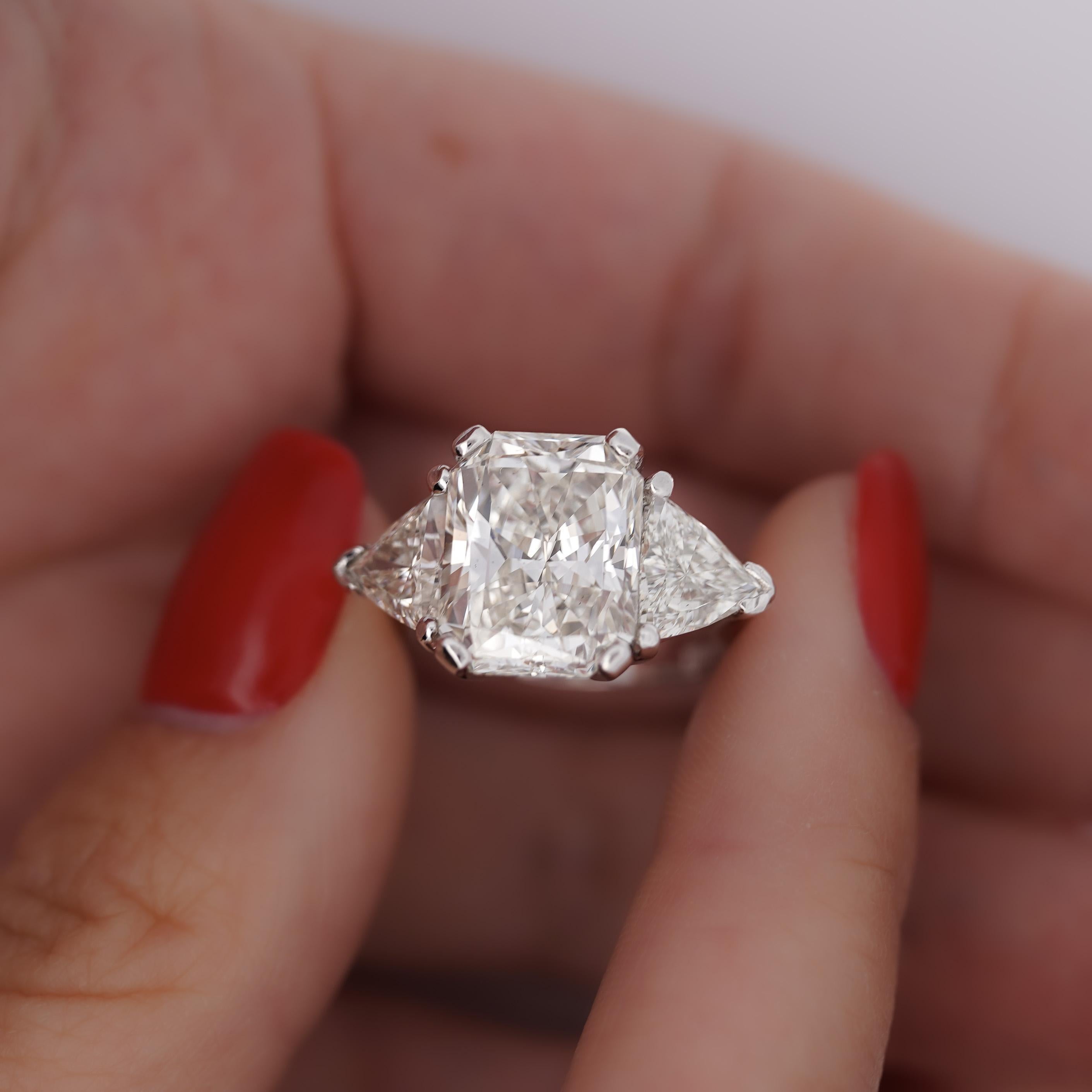 Women's 7.68 Carat TW Radiant Cut & Trillion Cut Three Stone Engagement Ring For Sale