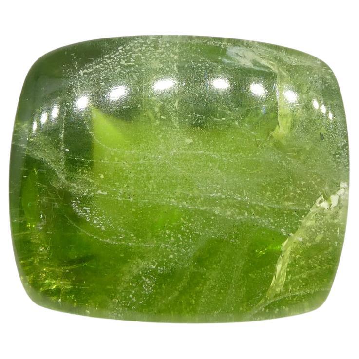 Description:

Gem Type: Peridot
Number of Stones: 1
Weight: 76.85 cts
Measurements: 26.50 x 22.565 x 10.29 mm
Shape: Cushion Sugarloaf Cabochon
Cutting Style Crown:
Cutting Style Pavilion:
Transparency: Transparent
Clarity: Moderately Included: