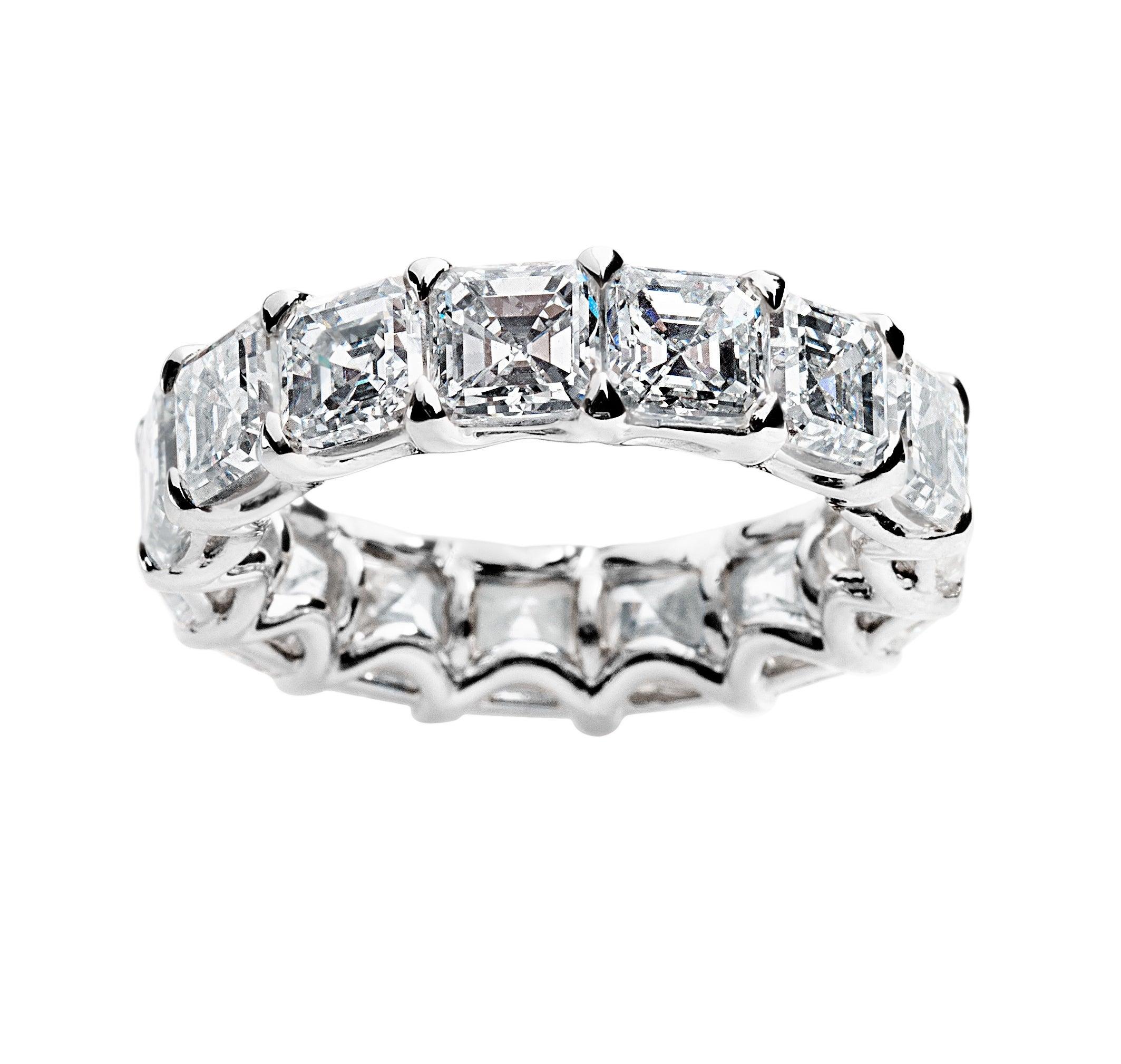 This beautiful ring features 15 perfectly matched Asscher Cut Diamonds weighing 7.69 Carats.
Stones are F-G color and VS Clarity.
Set in Platinum.
Size 6.