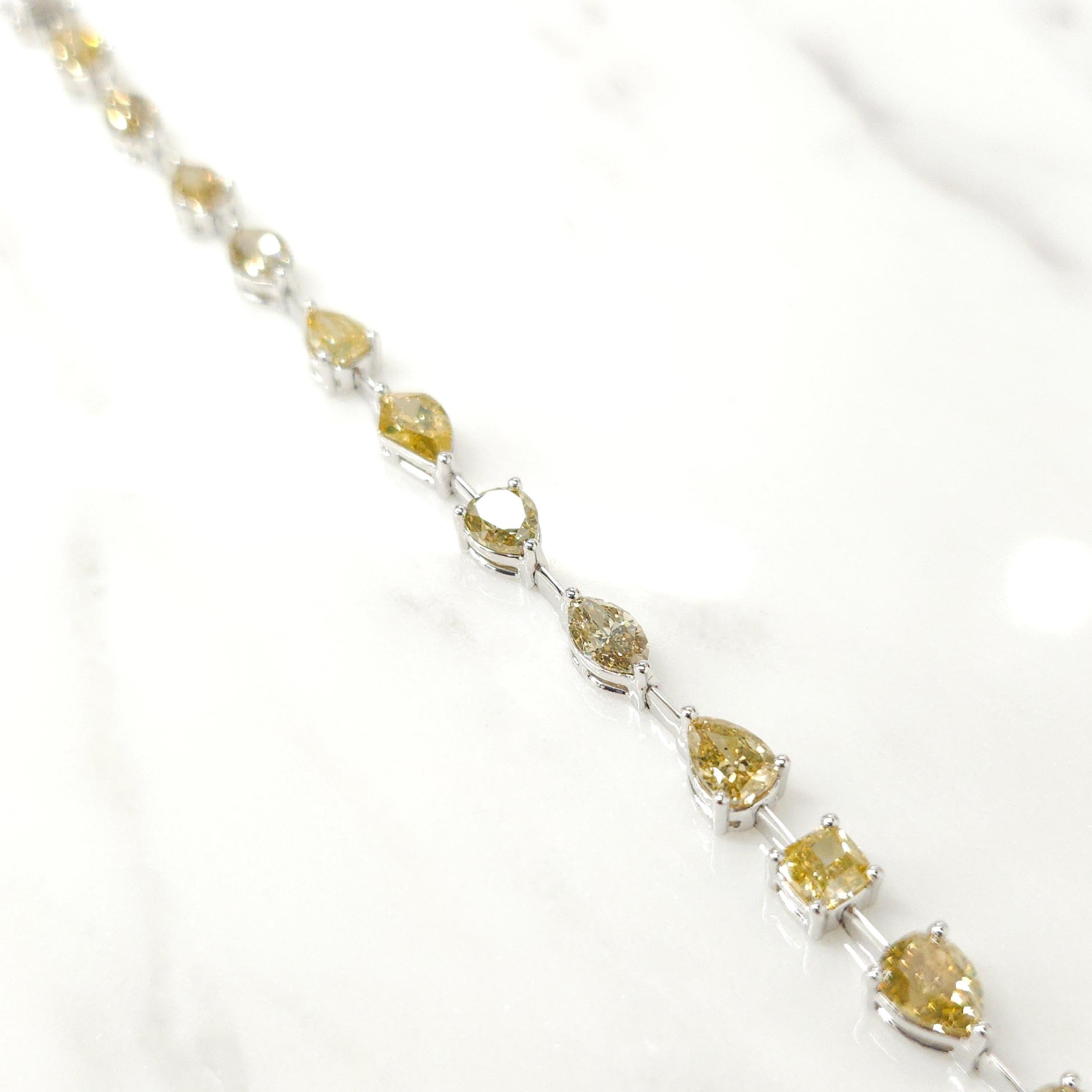 Modern 7.69 Carat Mixed Shaped Fancy Color Natural Diamond Tennis Bracelet in 18K Gold For Sale