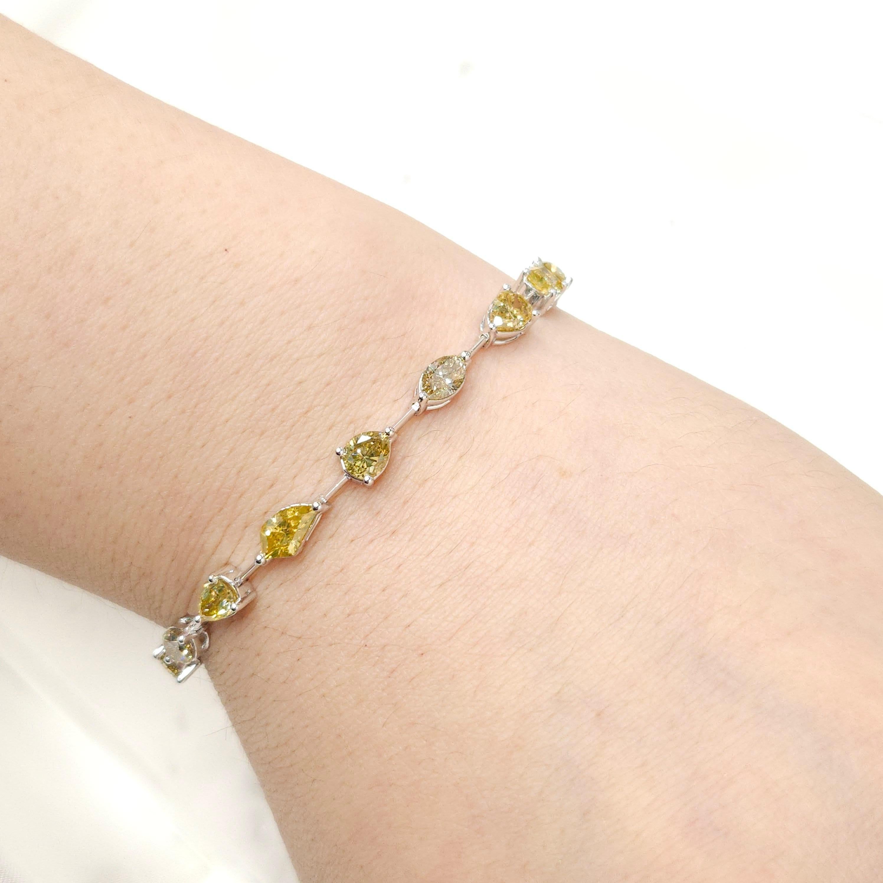 Pear Cut 7.69 Carat Mixed Shaped Fancy Color Natural Diamond Tennis Bracelet in 18K Gold For Sale