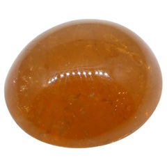 Garnet spessartine orange cabochon ovale de 7.69 carats du Nigeria