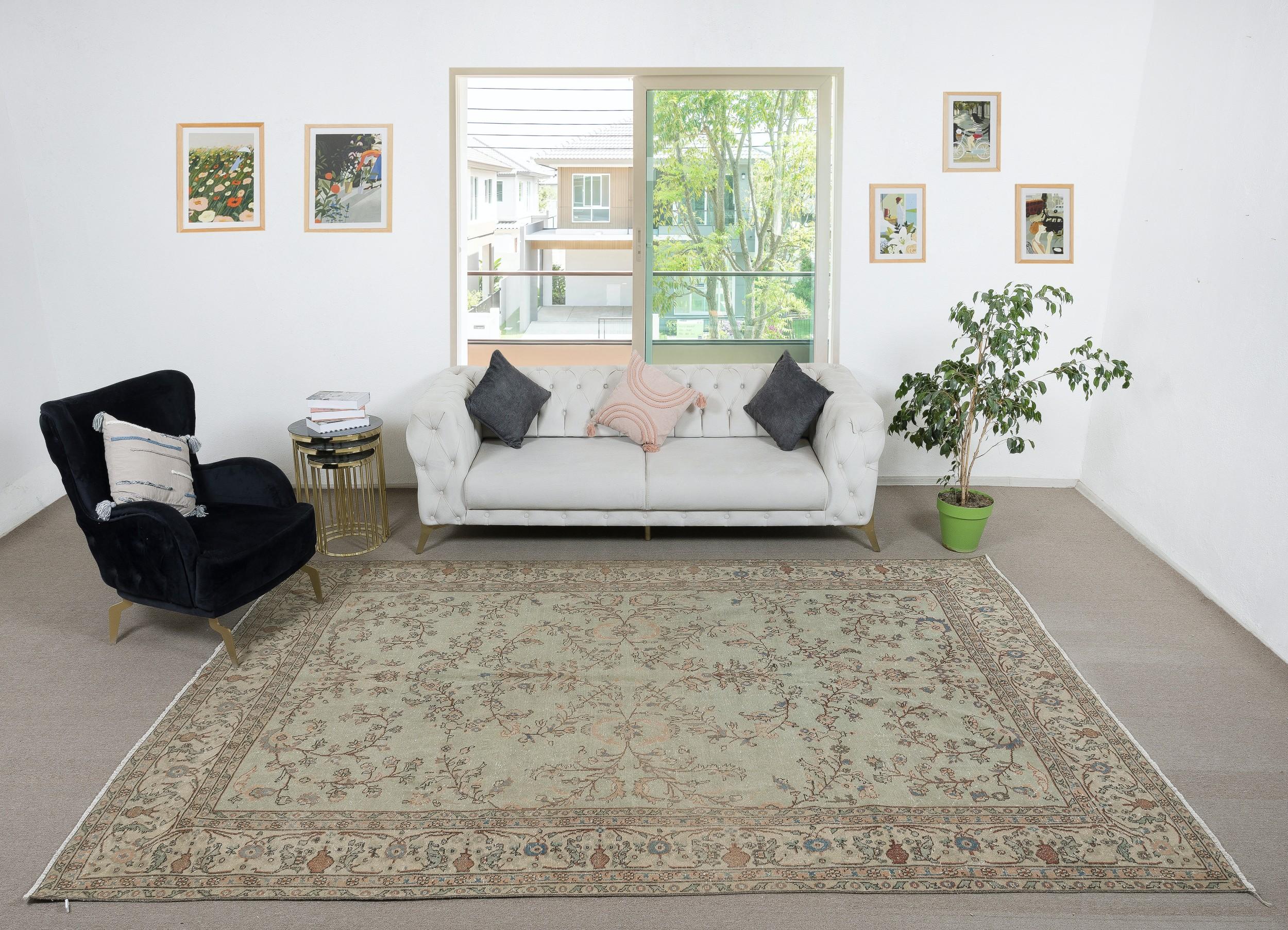 Infuse your home with the timeless beauty of this traditional vintage handmade Turkish rug, a hand-knotted masterpiece crafted from a luxurious blend of wool and cotton. Woven by skilled artisans using centuries-old techniques, this rug features